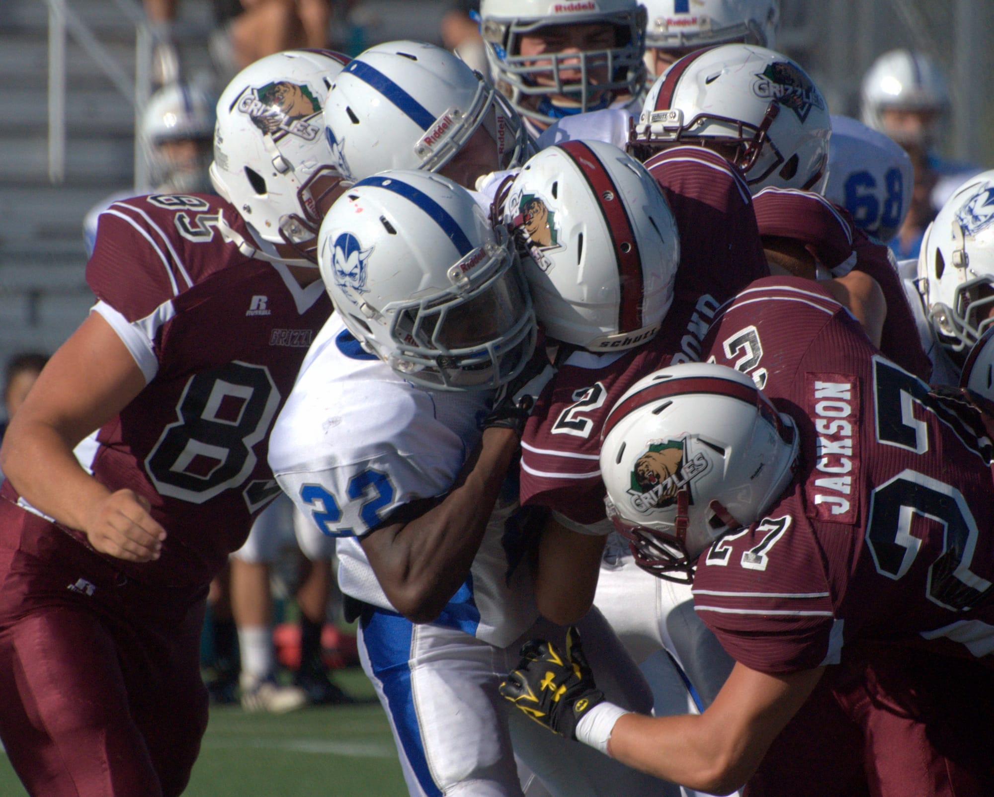 The Goffstown defense makes a stop against Salem.