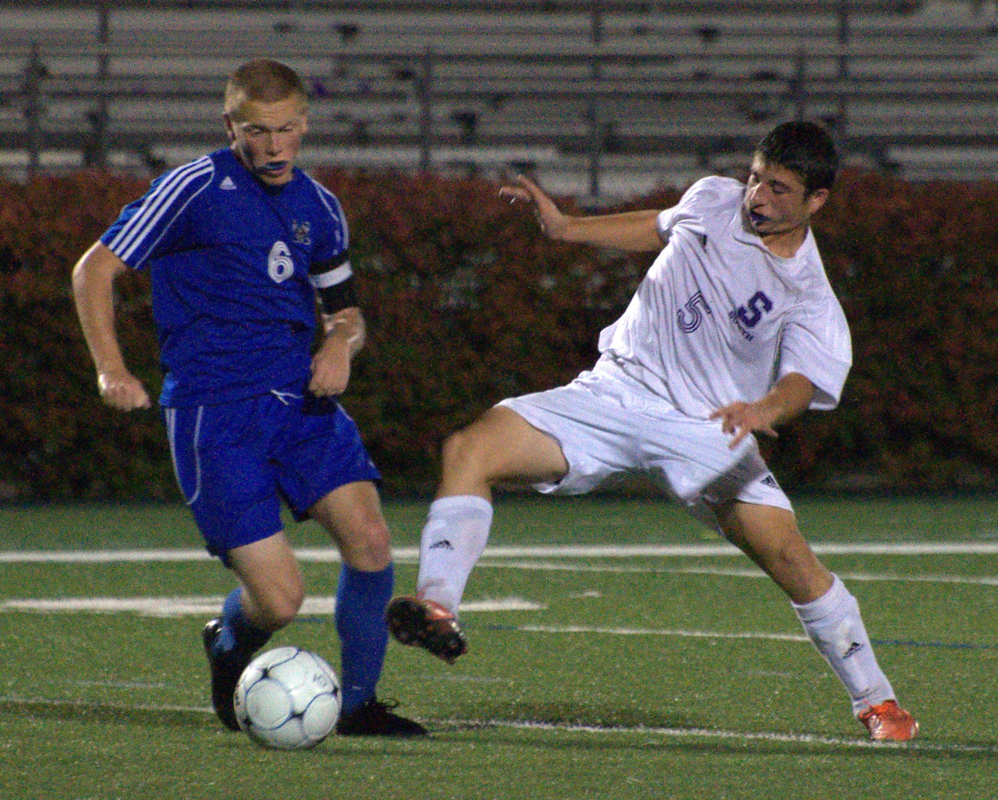 Merrimack's Riley Clark tries to keep the ball away from Nashua South's Logan McIntosh during Tuesday's game.
