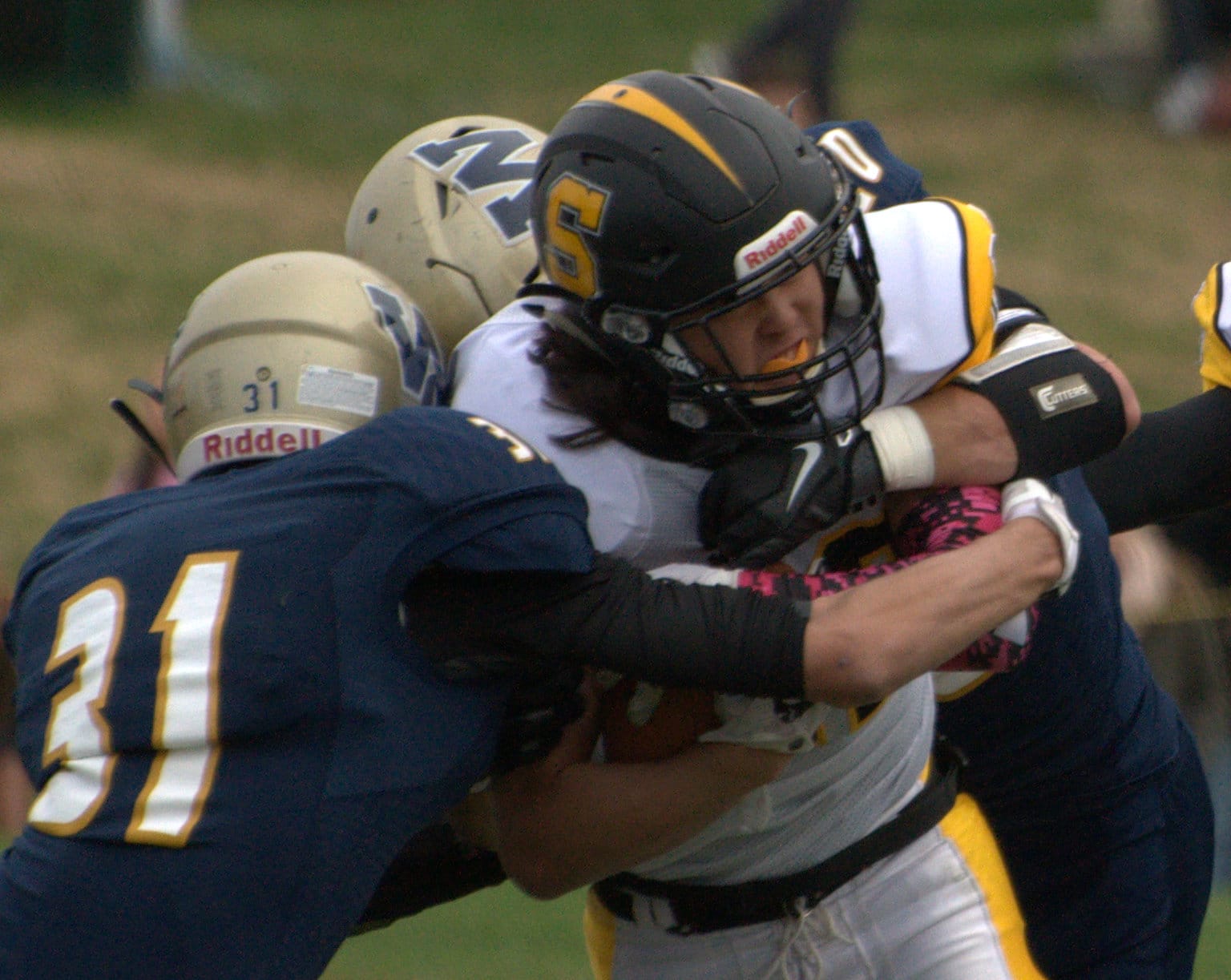 Windham's Parker Belsky wraps up Souhegan's Zach Bossi.