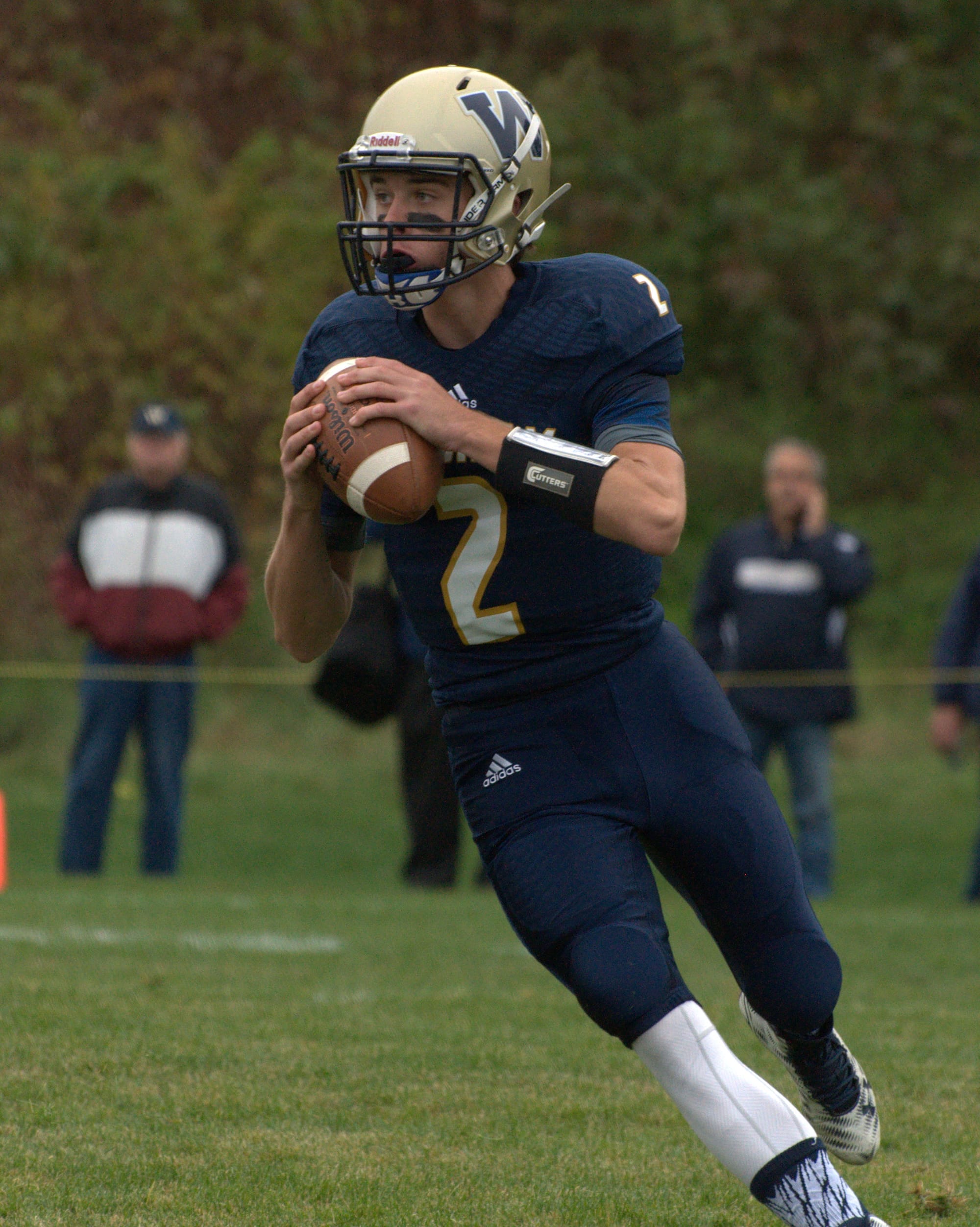 Windham quarterback Griffin Lippold looks for an open receiver.