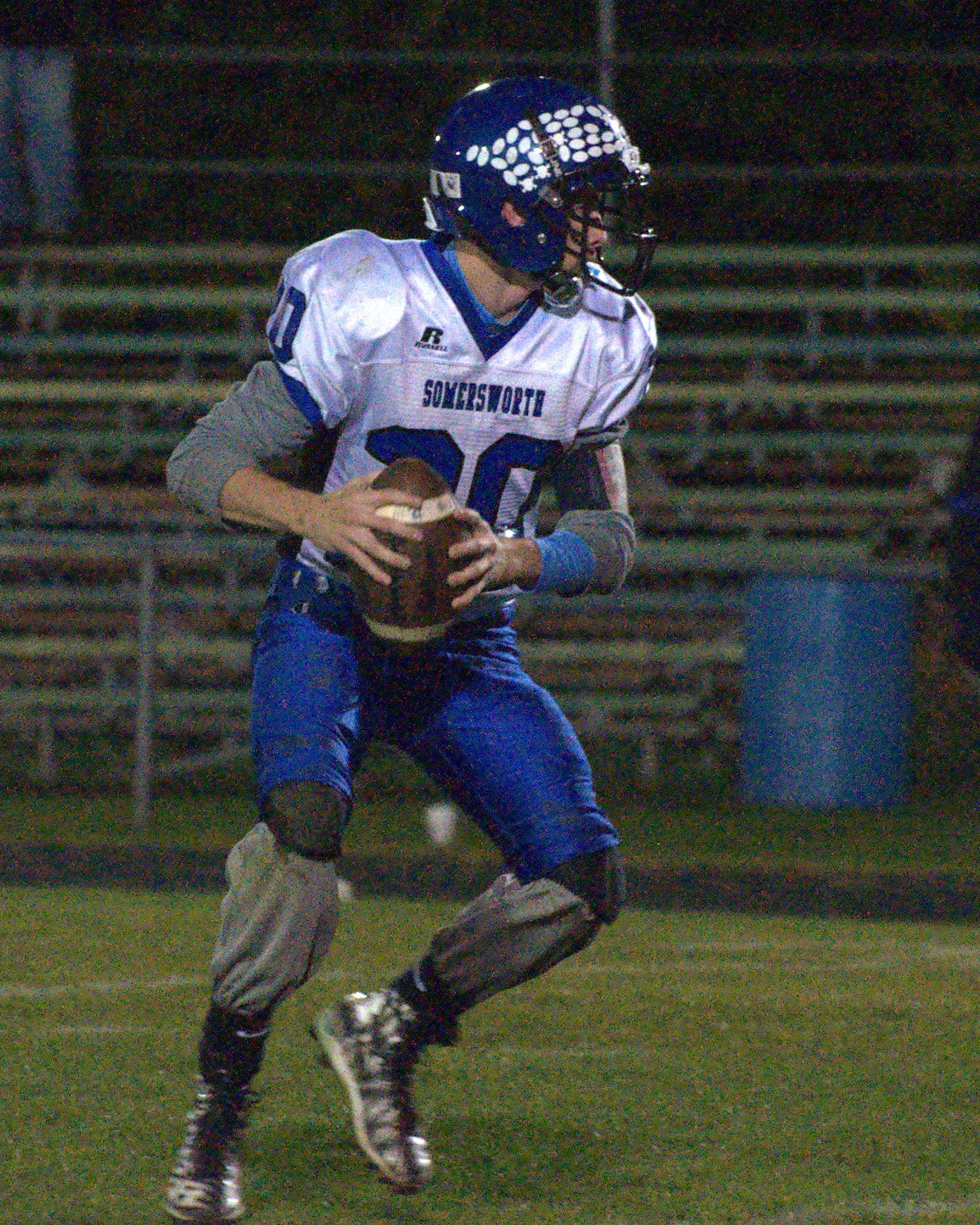 Somersworth's Matt Menz looks for a receiver during Saturday's game.