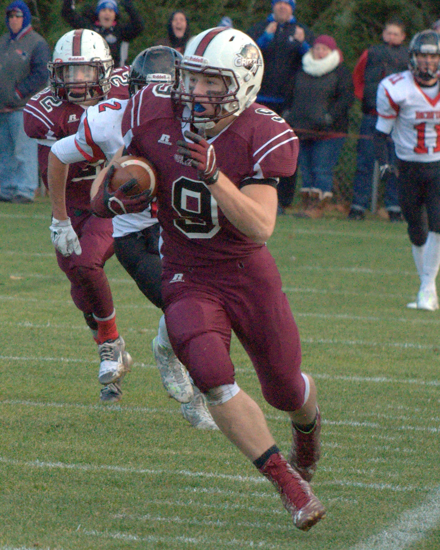 Goffstown's Andrew Duval tries to stay in bounds after interception a pass. The play was called back on a penalty.