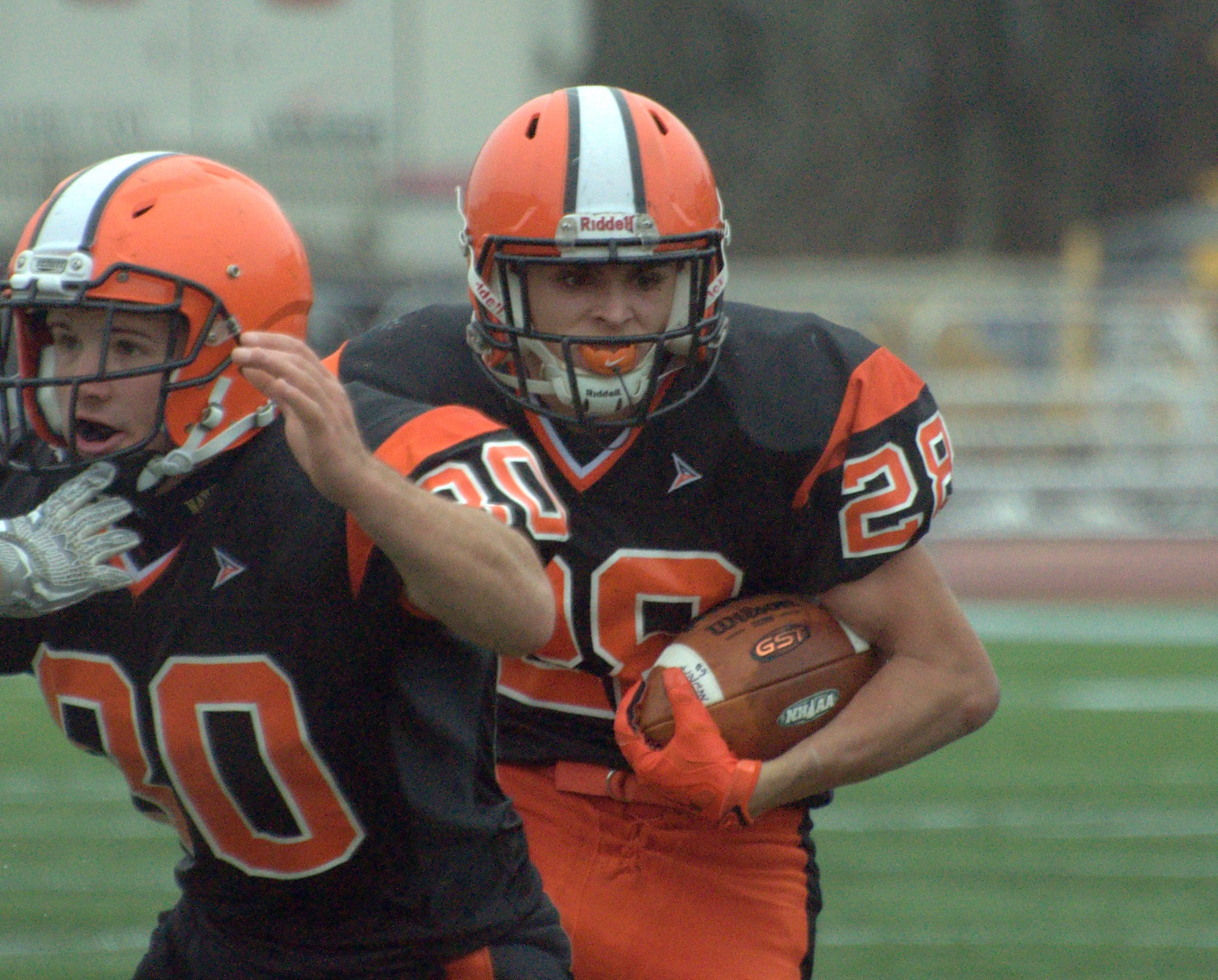Newport's Noah Wade picks up yards behind a block by Stephen Nix.