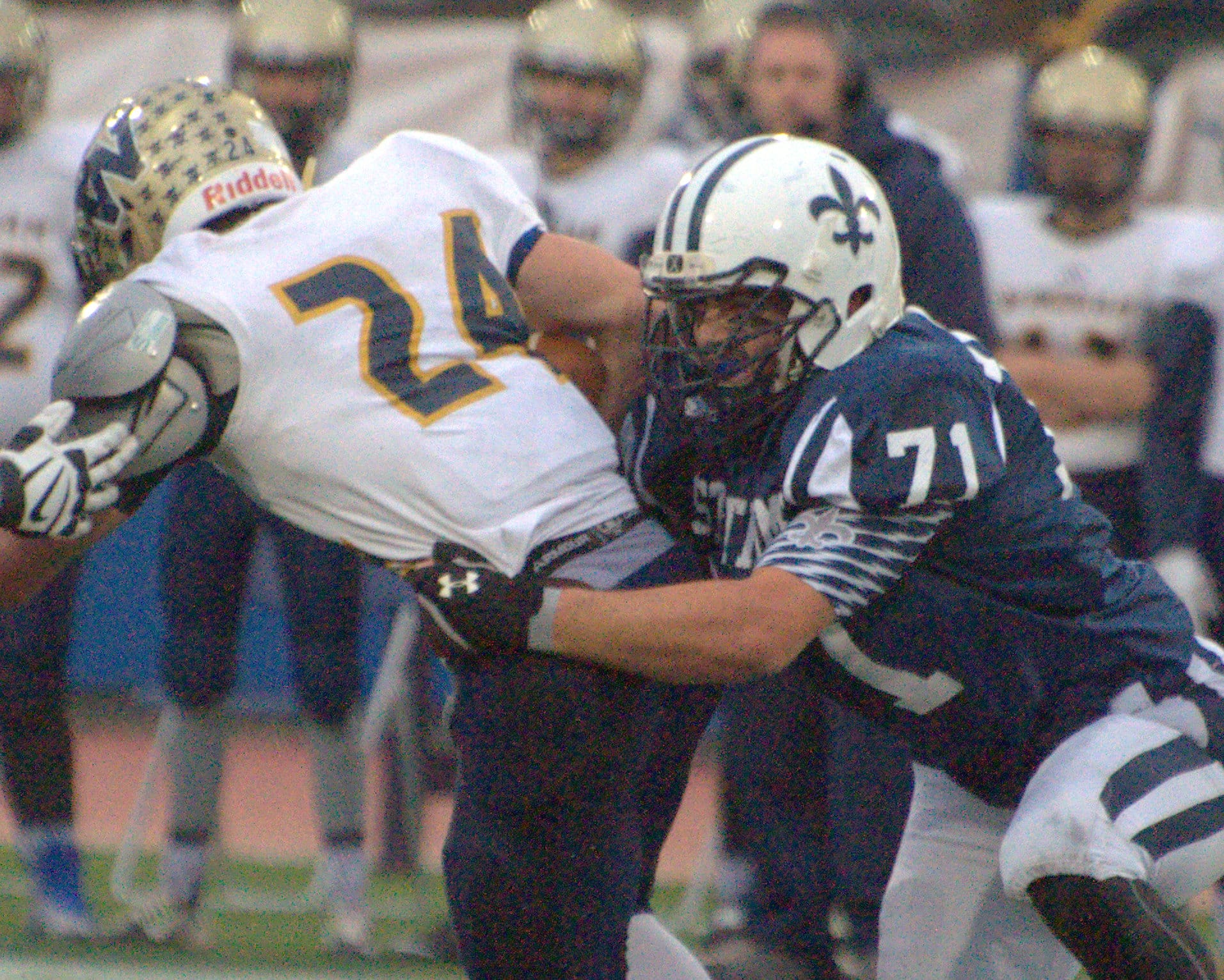 St. Thomas' Will Micali wrapups WIndham's Matt Shea.