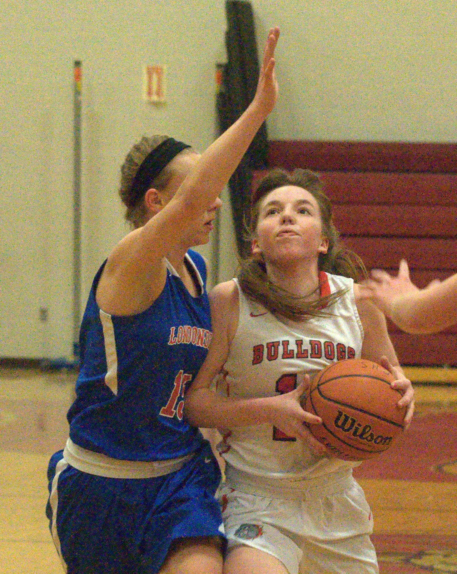 Bedford's Bri Purcell tries to drive to the basket against Londonderry's Kate Balcom.