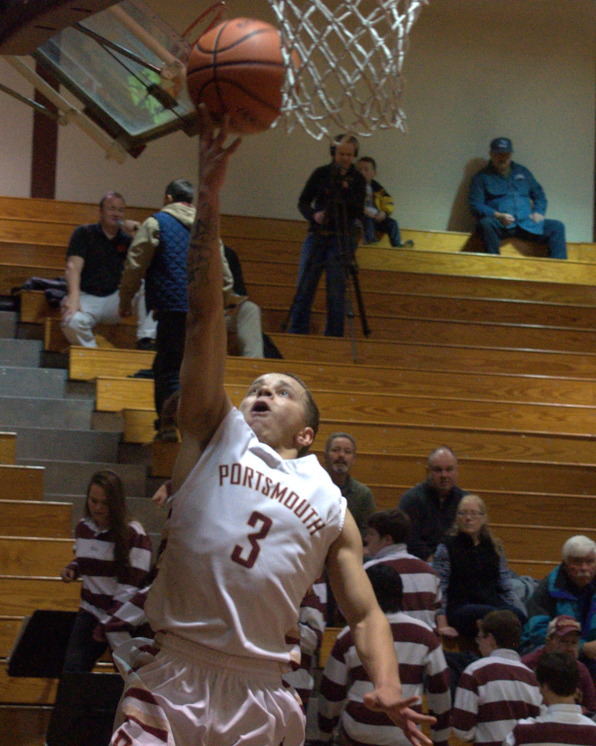 Portsmouth's Romeo Ingram goes in for a layup during Friday's game.