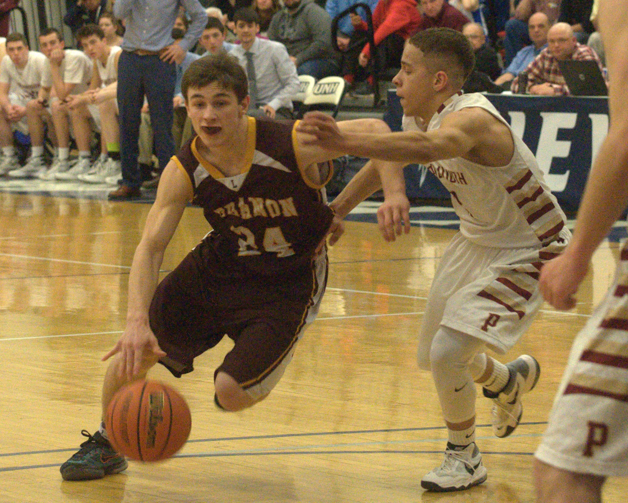 Lebanon's Ryan Milliken tries to get by Portsmouth's Romeo Ingram.