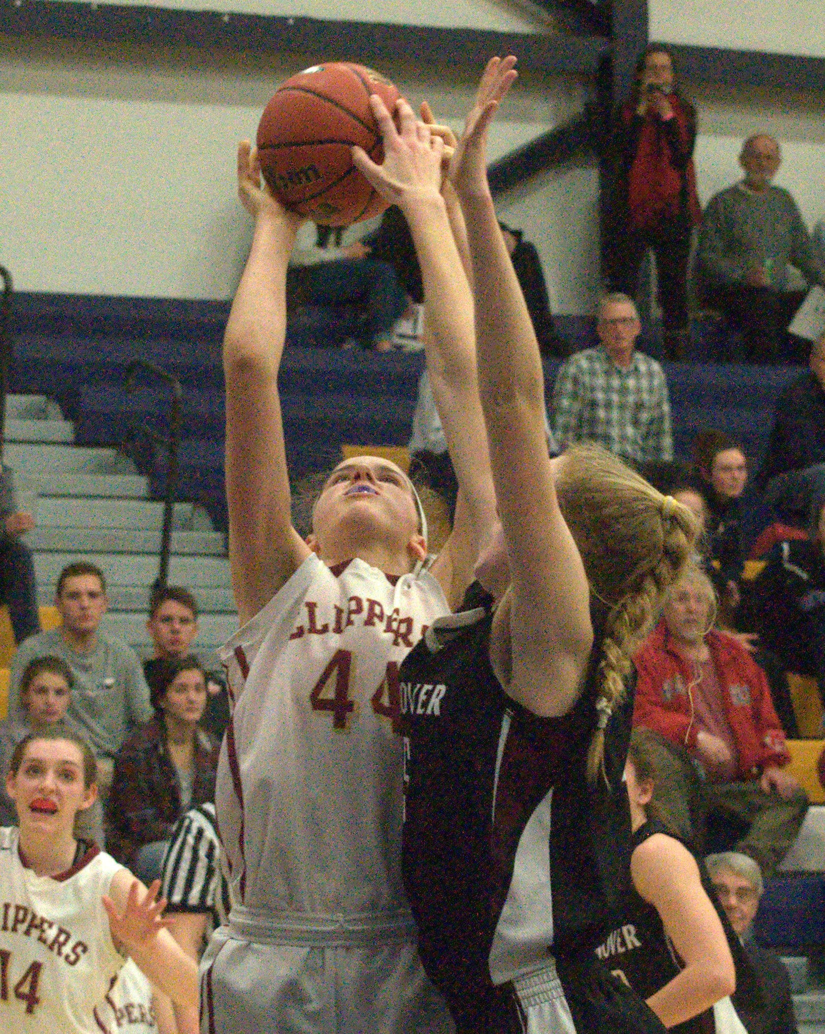 Hanover's Silke Milliman tries to block a shot by Portsmouth's Abbe Laurence.