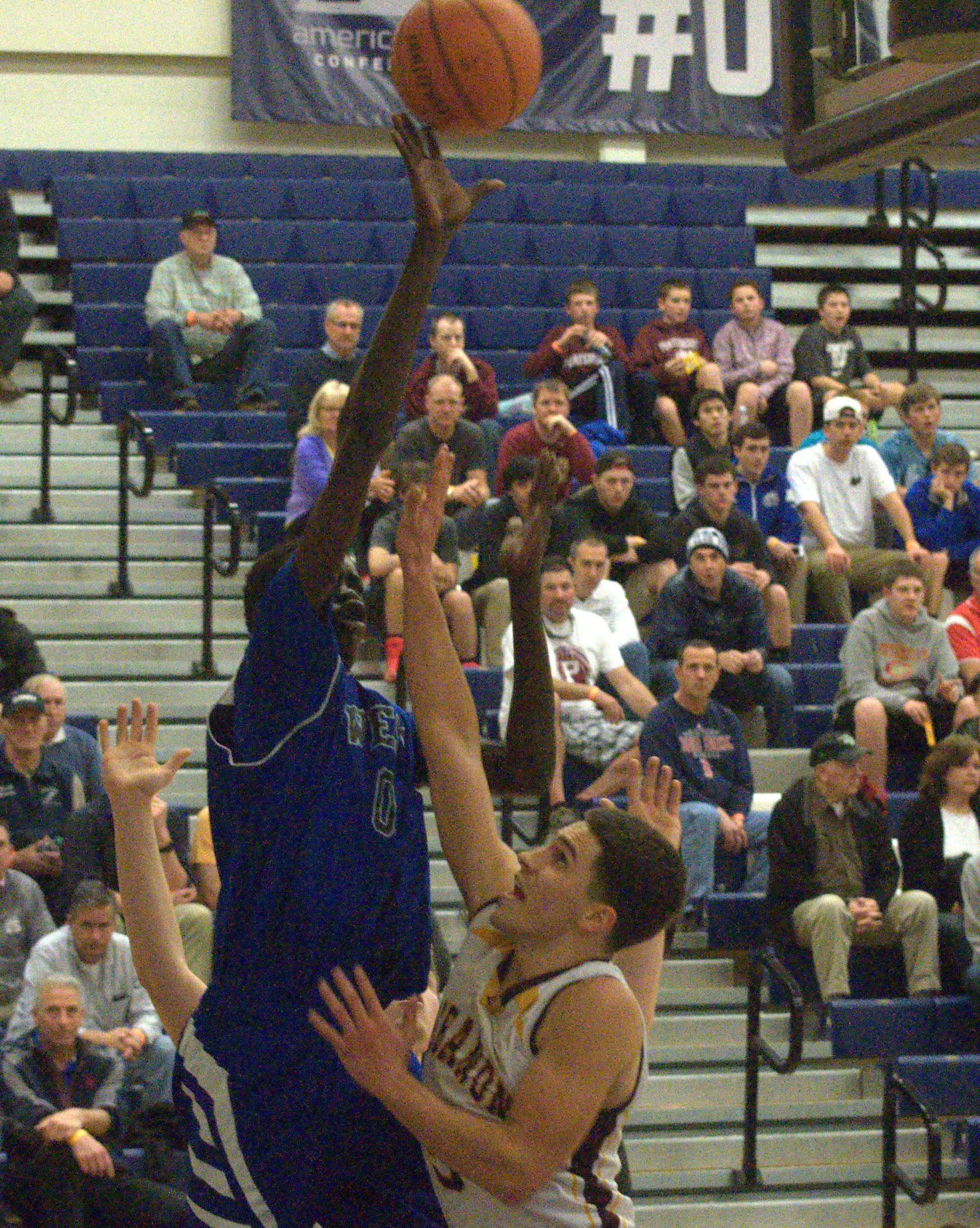 Manchester West's Akok Akok shoots over Lebanon's Austin Whaley.