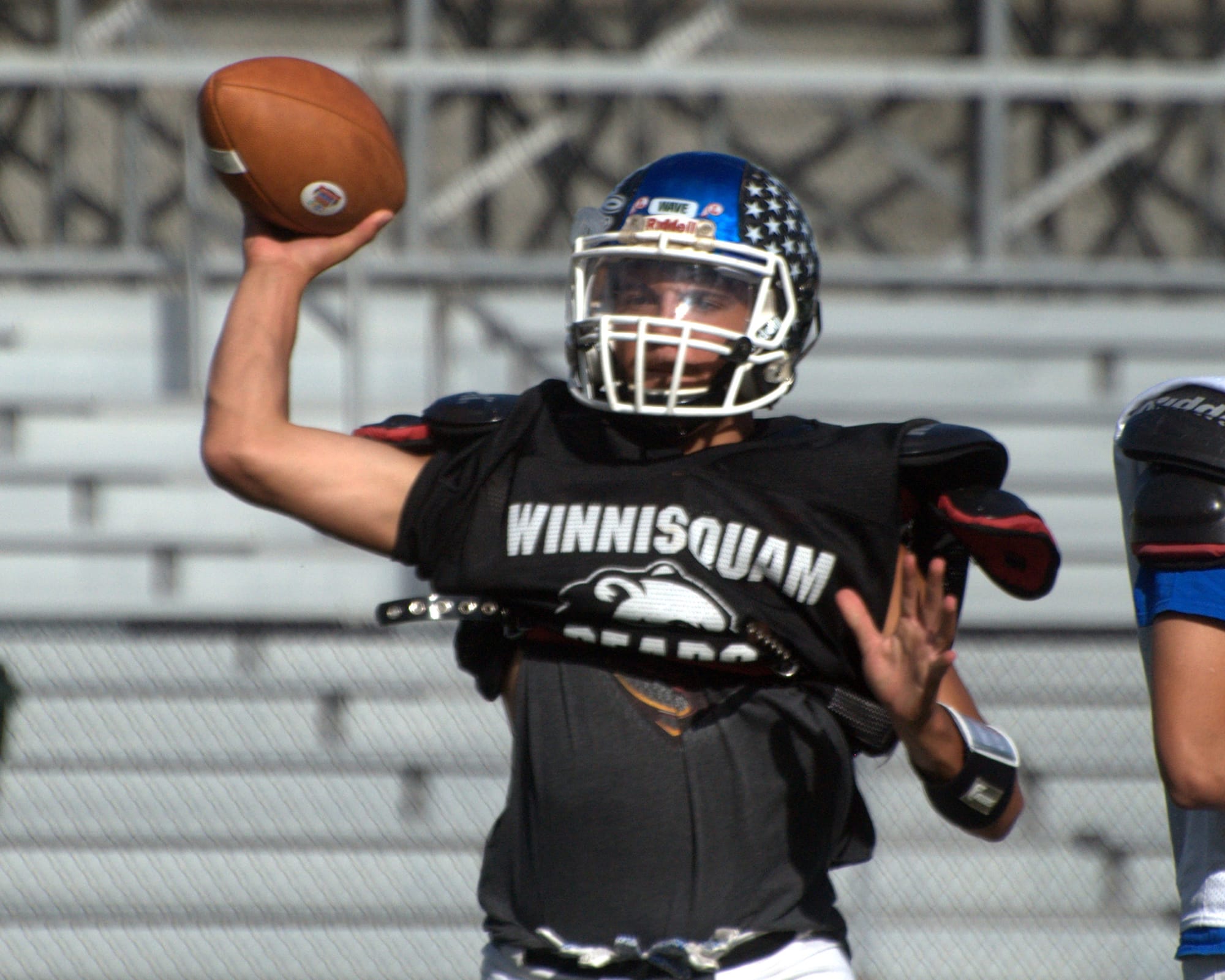 Christian Serrano makes a throw during practice for Saturday's game.