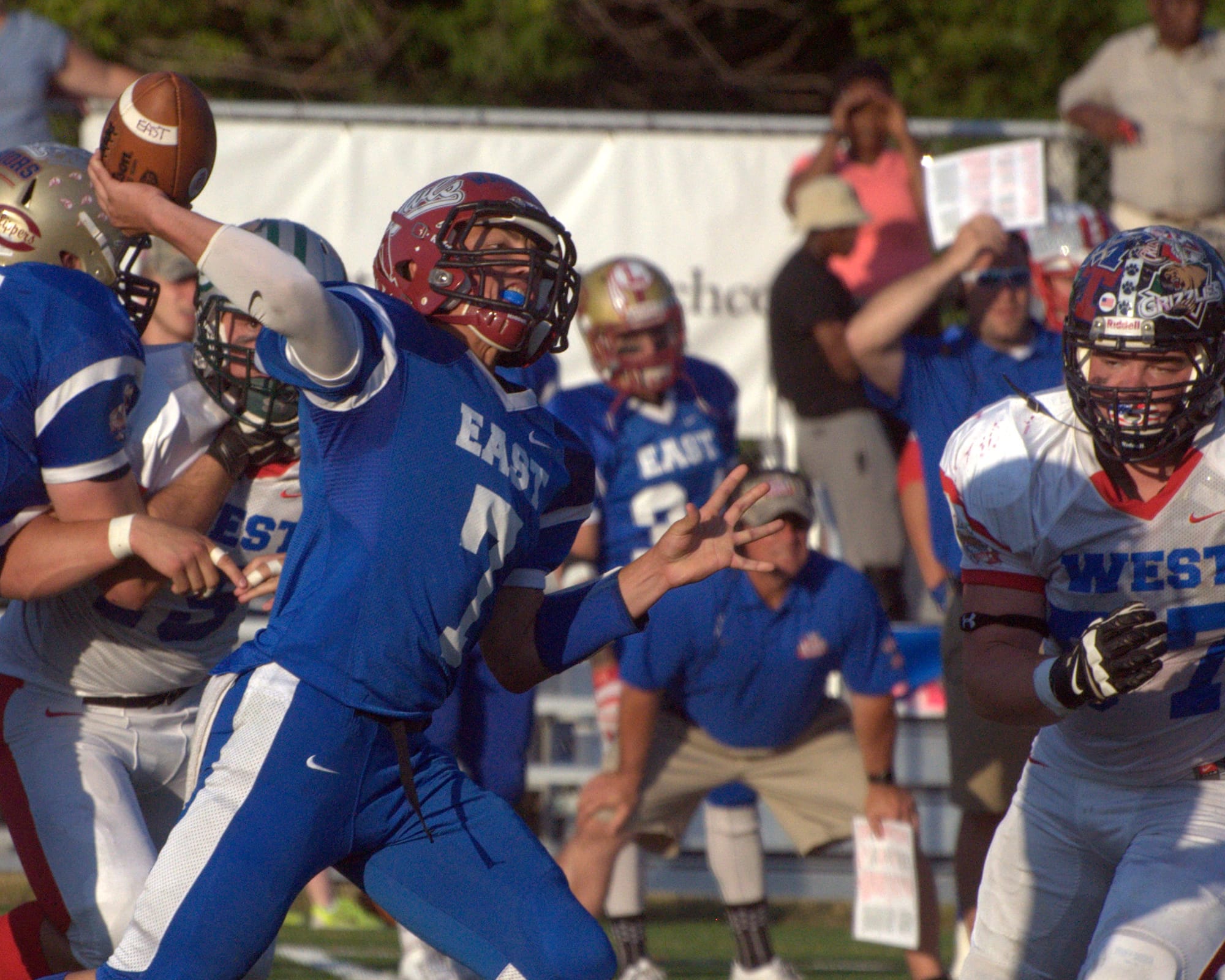 Jason Hughes throws a pass during Saturday's game.
