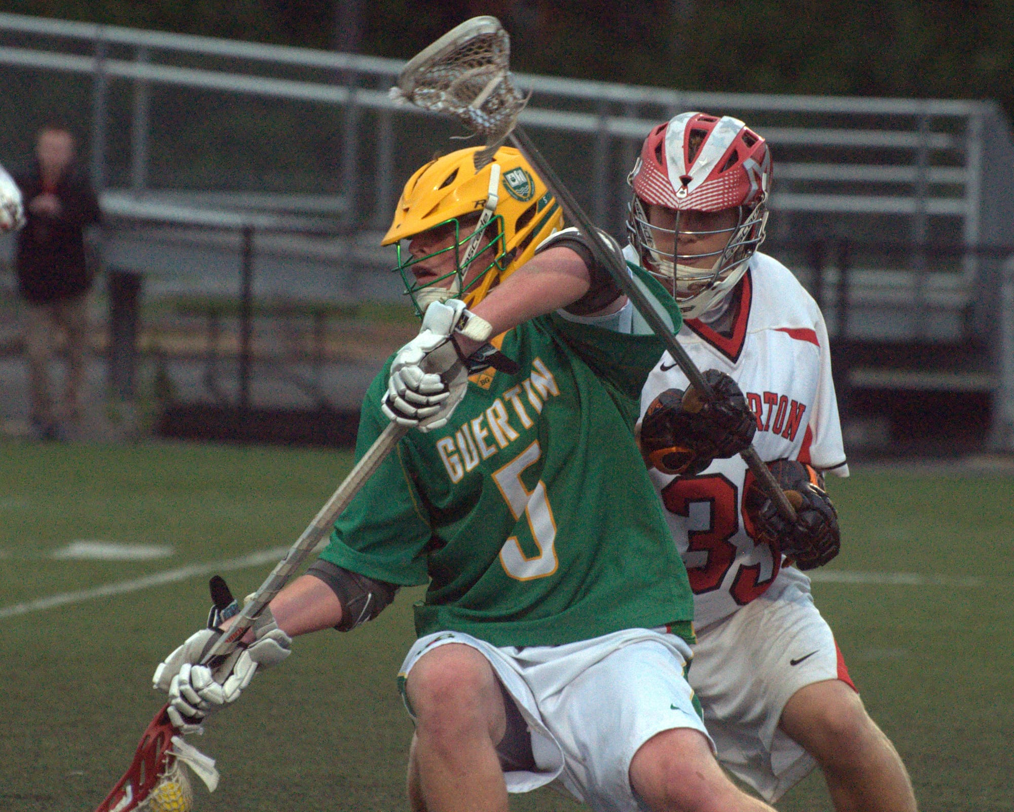 Bishop Guertin's Charlie O'Brien tries to get away from Pinkerton's Cam Richard.