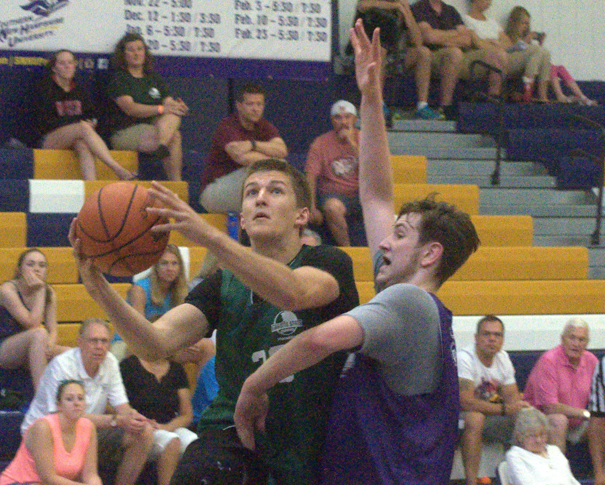 Monadnock's Matt Eylander drives to the basket against Southern's Nolan Anderson.