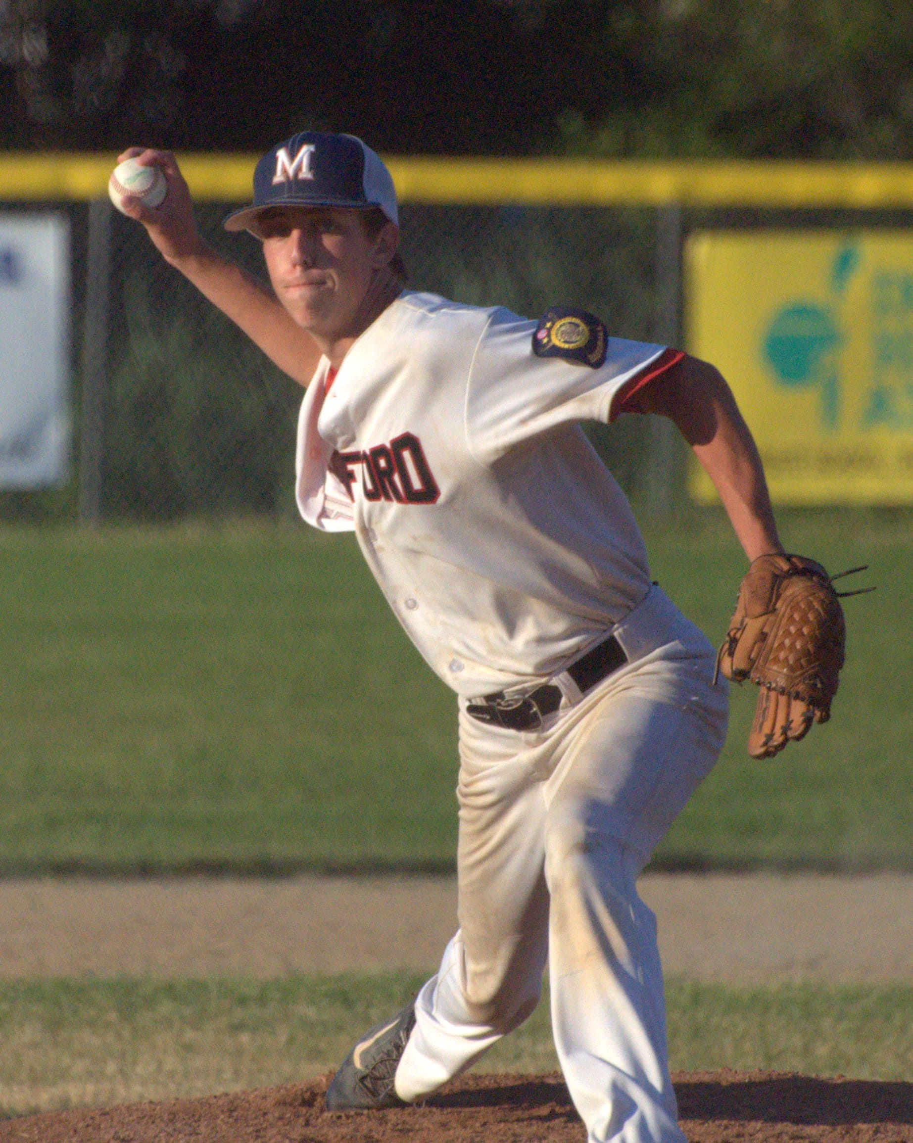 Milford pitcher Joey Grassett delivers a pitch.