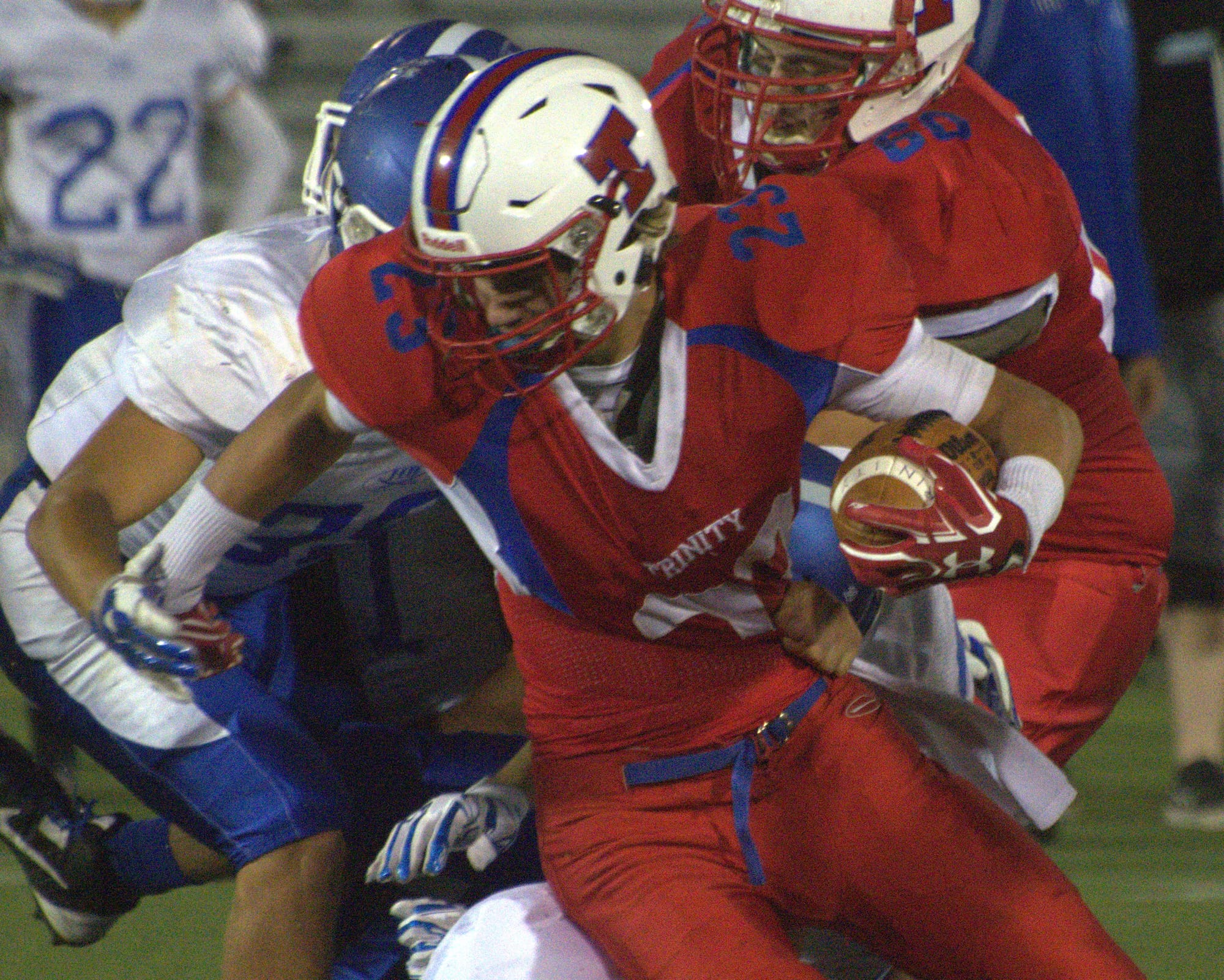 Trinity's Jake Cole carries the ball during Saturday's game.