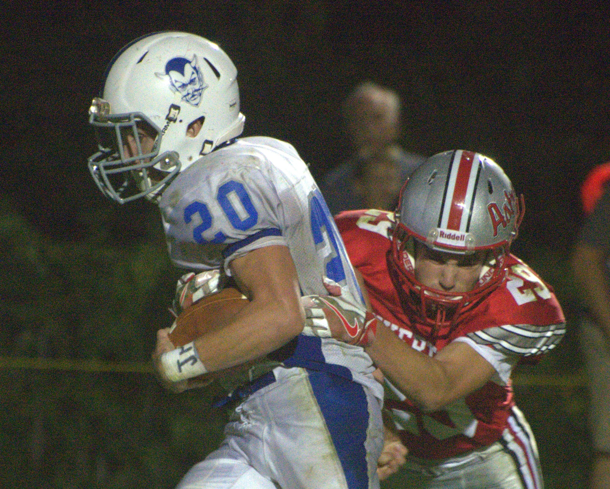 Salem's James LeBlond tries to fight off a tackle by Pinkerton's Matthew Newman.