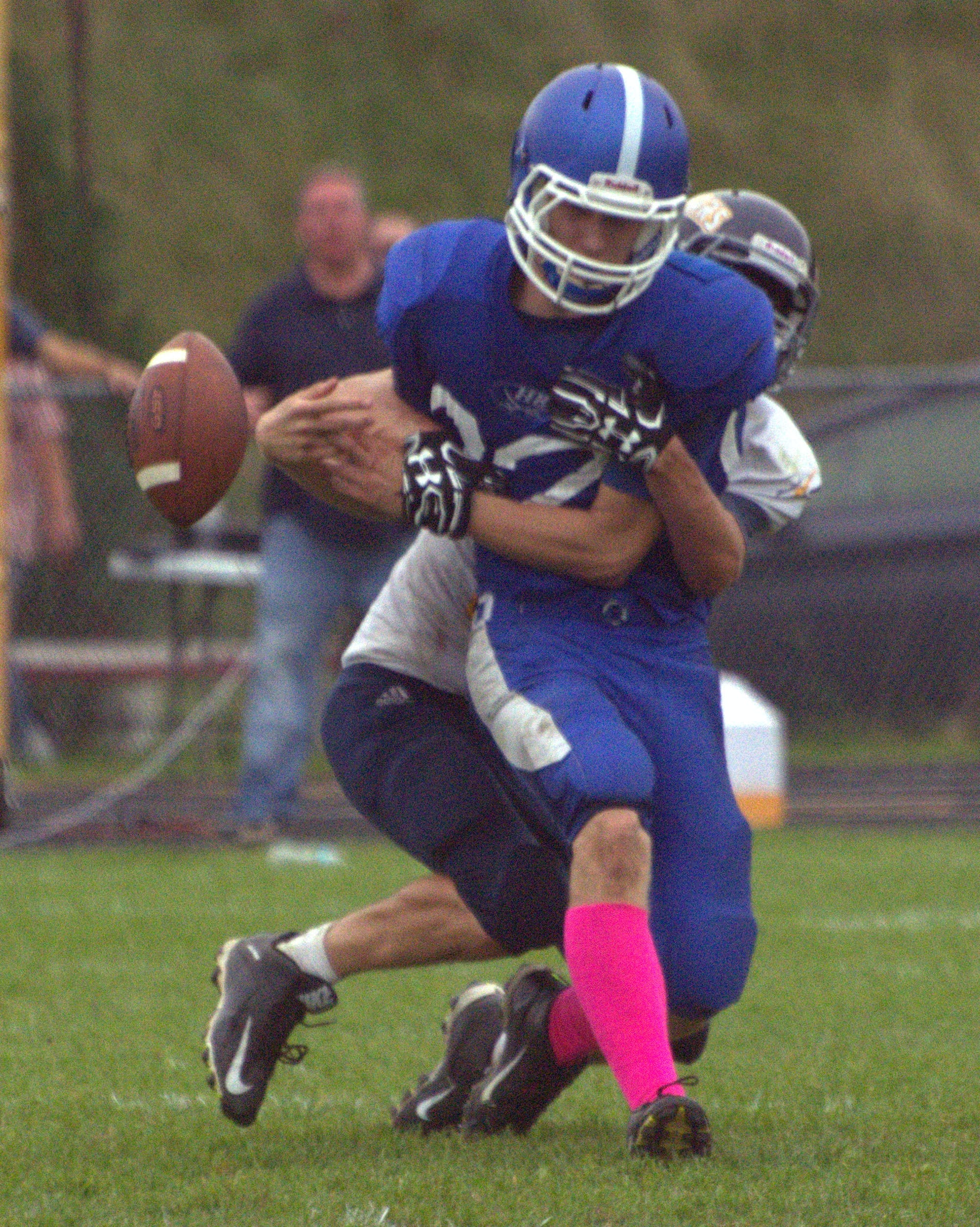 Hollis Brookline's Matt Simco can't hang on to this pass.
