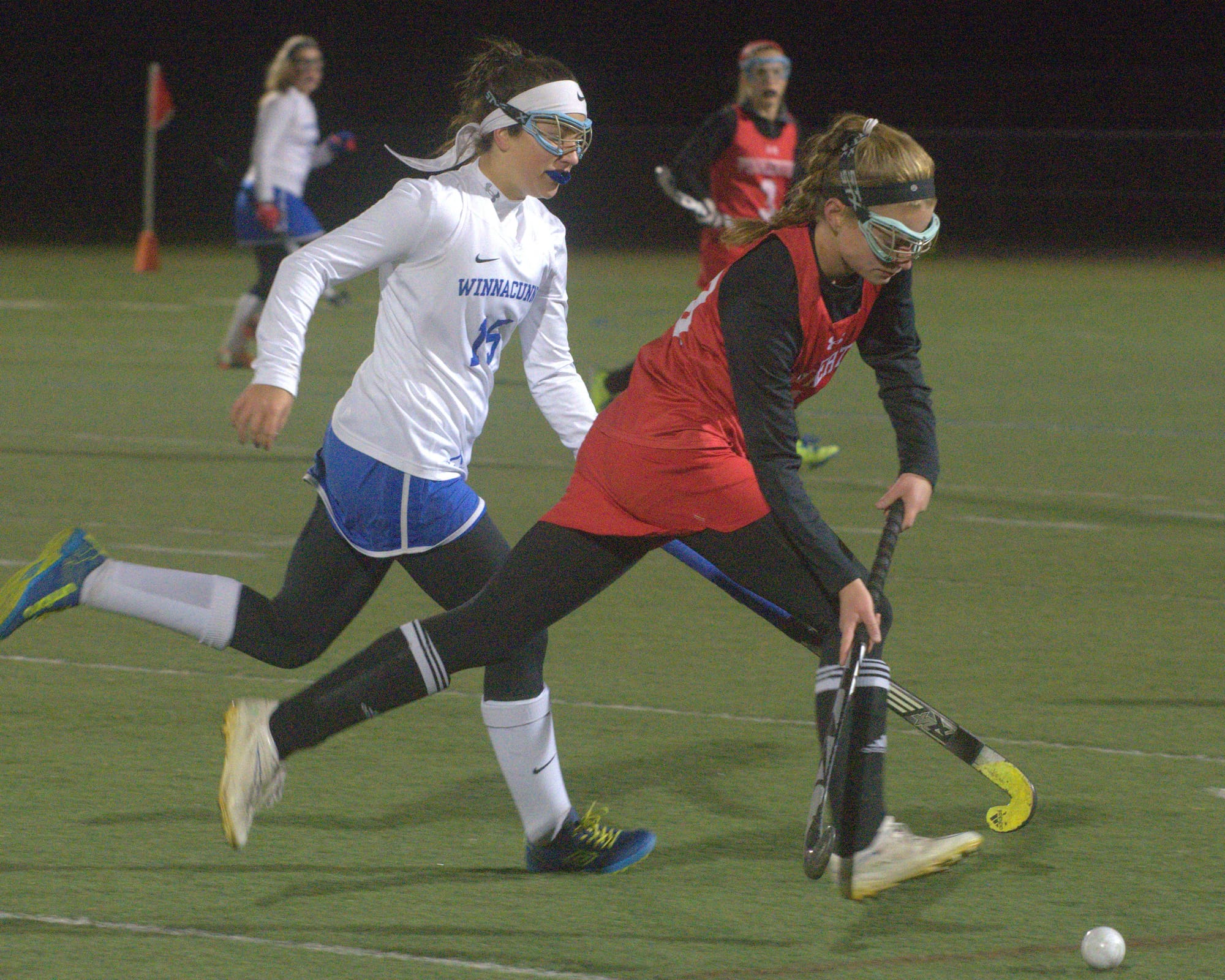 Pinkerton's Ava Dorci tries to get by WInnacunnet's Brileigh April.