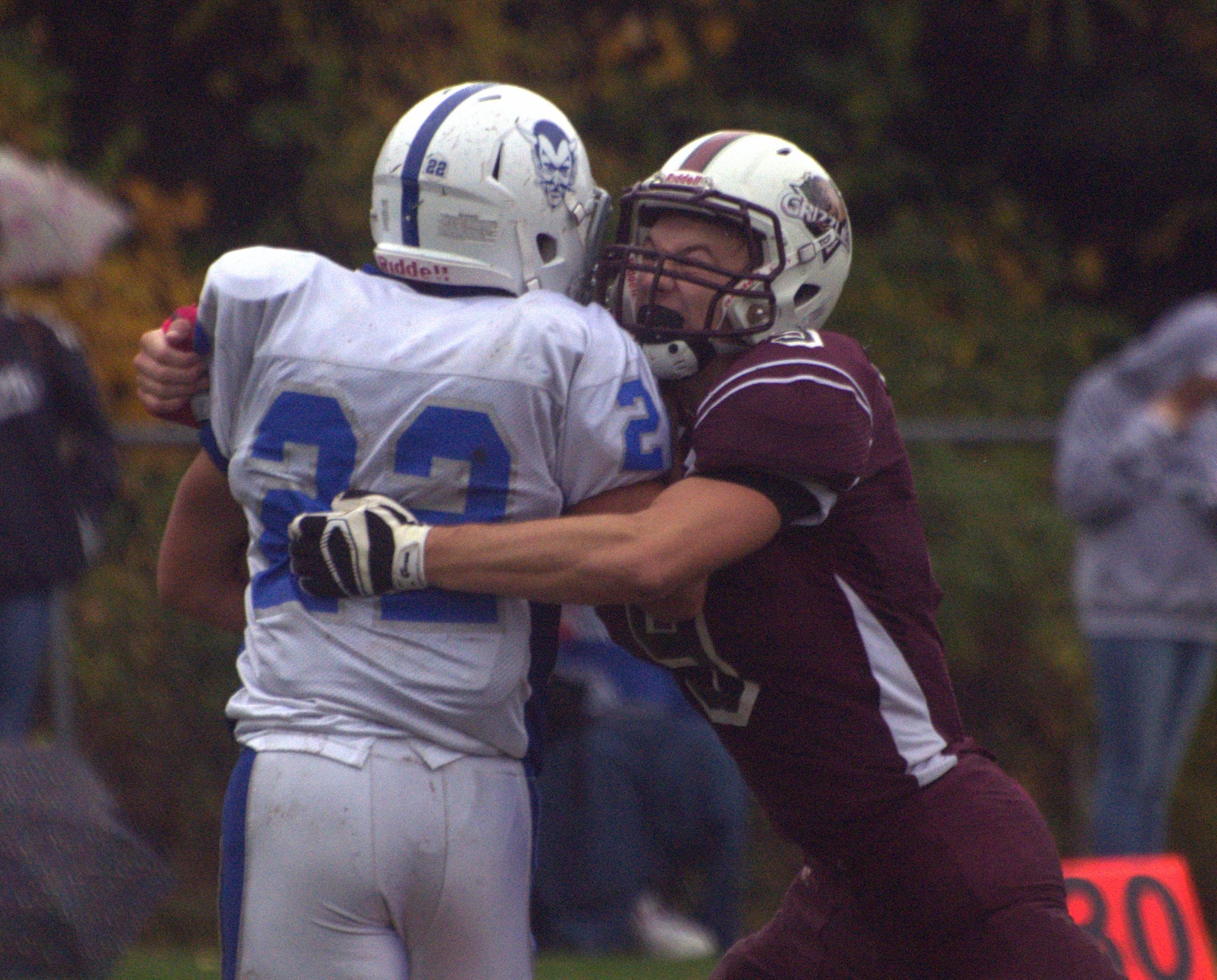 Goffstown's Andrew Duval wraps up Salem's Josh Maroun.
