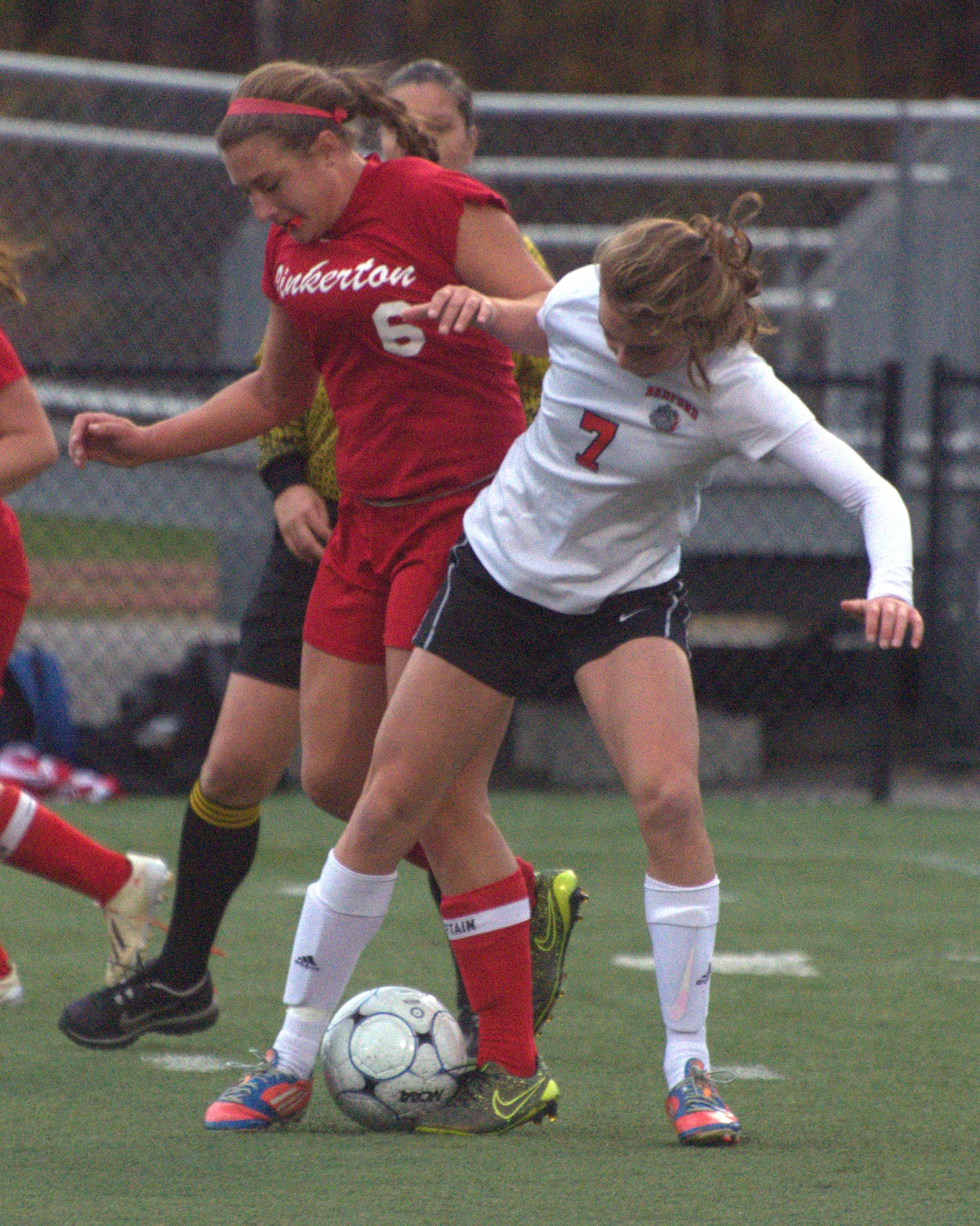 Pinkerton's Reanna Romano and Bedford's Gabrielle DeAngelis fight for the ball.