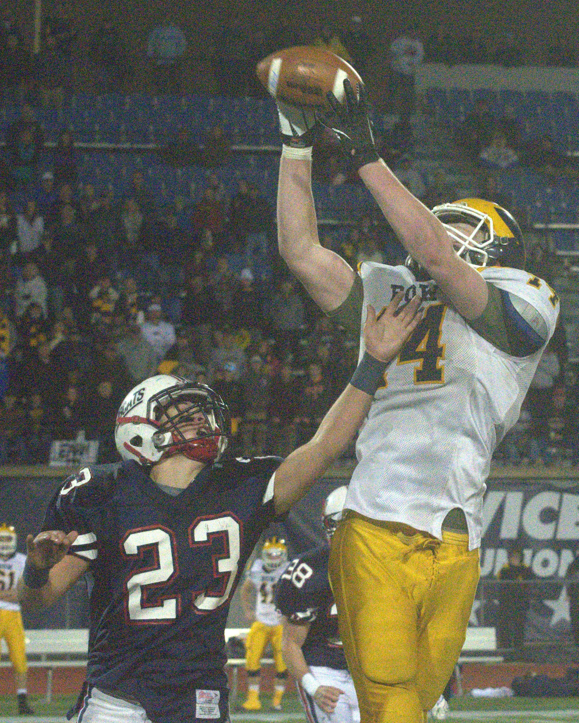 Bow's Nate Alford makes a catch over Plymouth's Wesley Lambert.