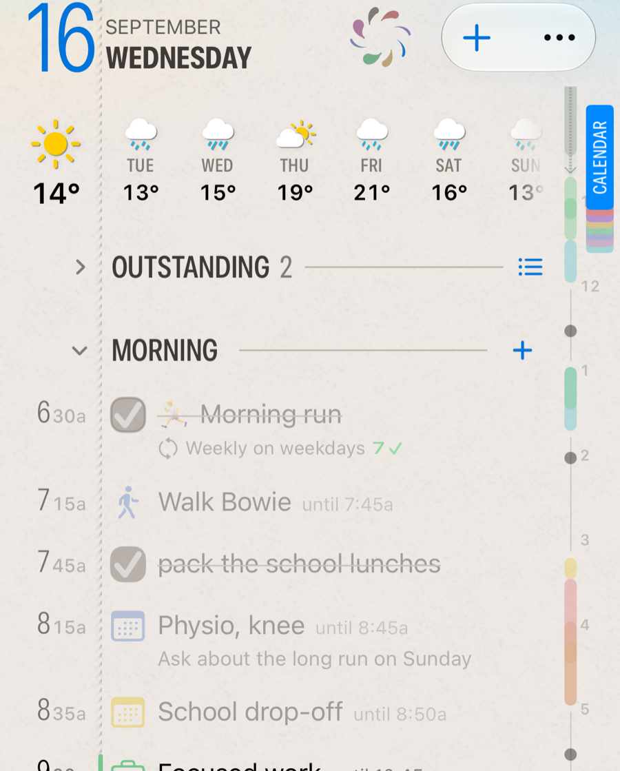 The top of a Daily page with the stacked Calendar bookmark deck in the right margin, one colored tab per calendar, beside the morning's events