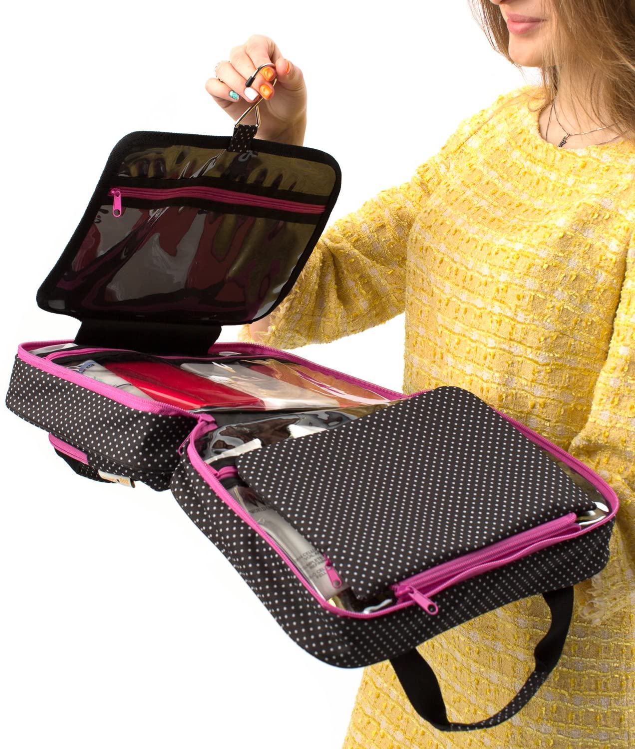 Woman in yellow dress holding and opening makeup bag