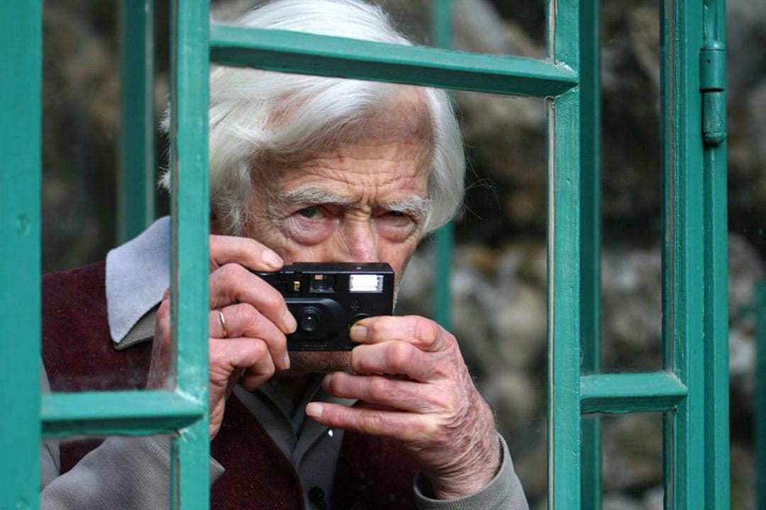 法国摄影师马克·吕布（Marc Riboud)。