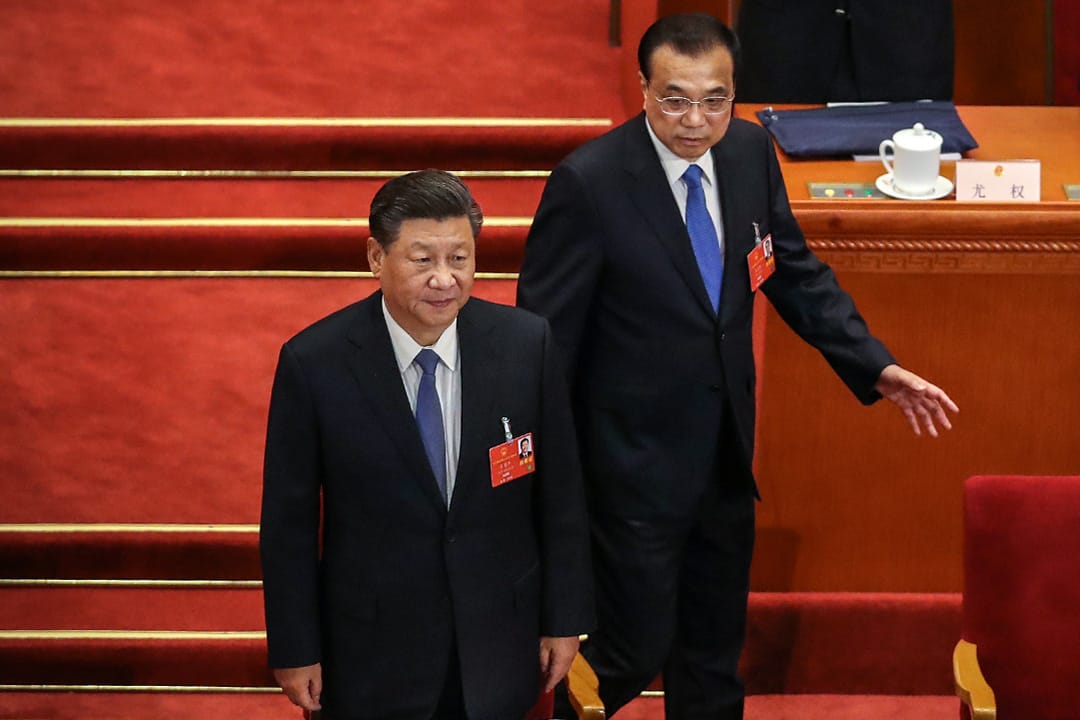 2020年5月25日北京,中国国家主席习近平和中国国务院总理李克强在全国人民代表大会第二次全体会议开始时进场。