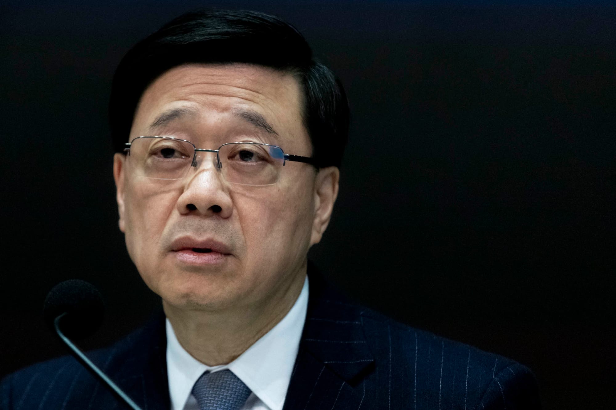 2024年1月30日，行政长官李家超主持“维护国家安全：《基本法》第二十三条立法公众咨询”记者会 。摄：林振东/端传媒