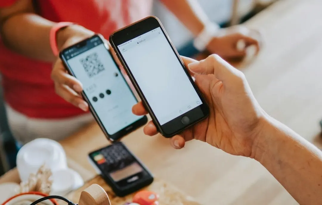 A diverse group of consumers confidently managing their personal finances on digital devices, representing evolving credit landscapes.