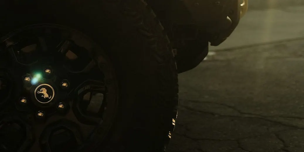 A rugged Ford F-Series Super Duty pickup truck symbolizes the automaker's strategic expansion into defense logistics and technology supply.