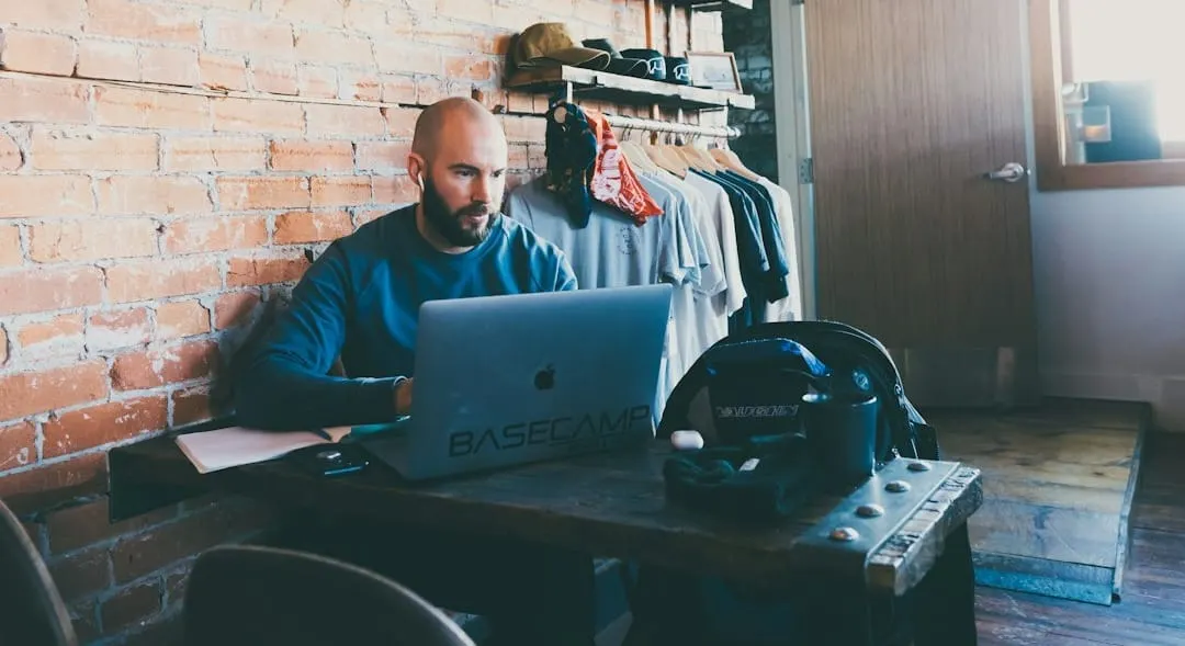 A diverse worker manages multiple digital and physical side hustles, symbolizing the evolving landscape of the labor economy and its impact on retail and supply chain stability.