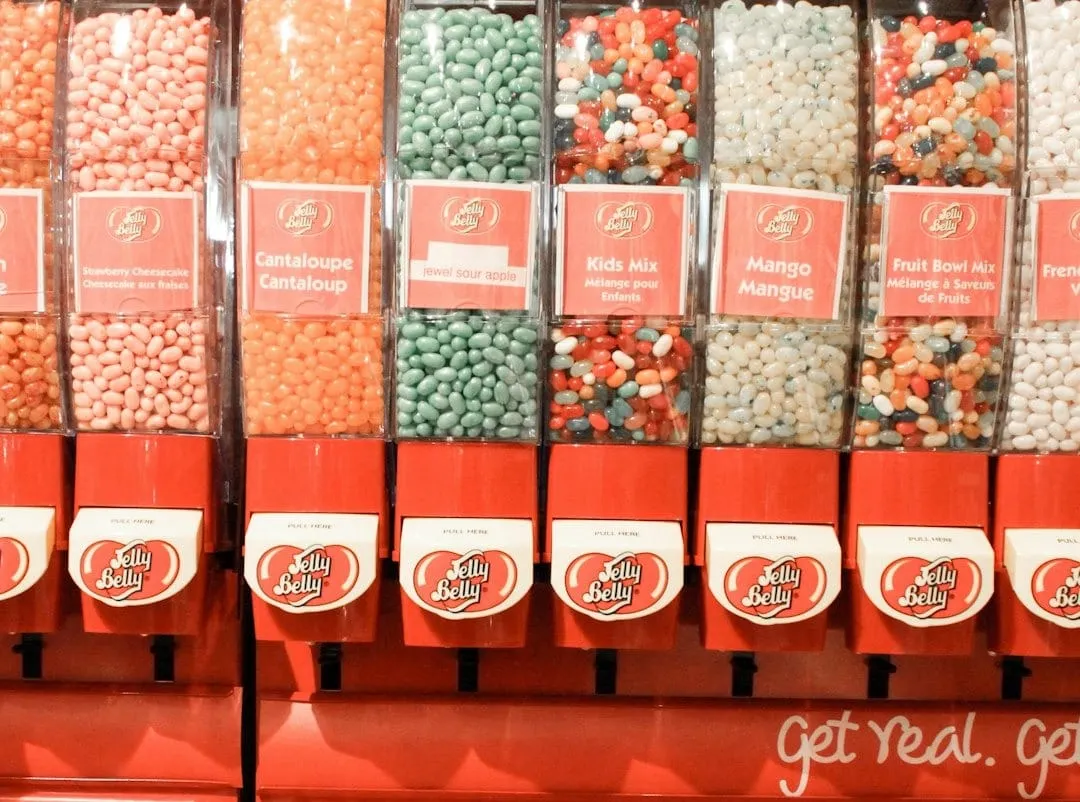An array of vibrant Jelly Belly gourmet candies are elegantly displayed, symbolizing the brand's sophisticated repositioning for modern consumer palates.