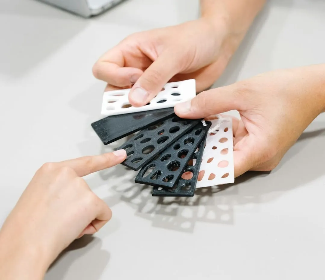 A digital interface showing creative content, with hands representing both AI influence and human artistic touch in marketing.