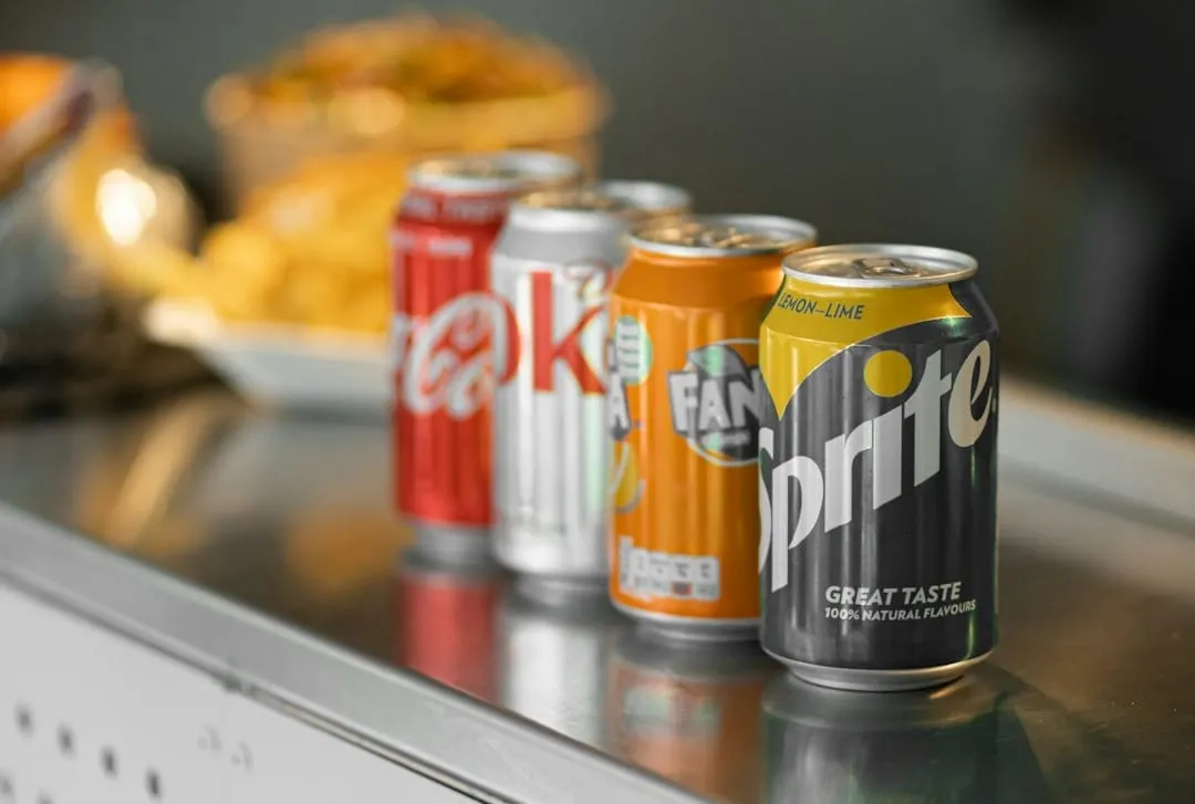 Limited-edition Sprite cans featuring hip-hop lyrics and a QR code, representing an innovative omnichannel marketing strategy to engage consumers.