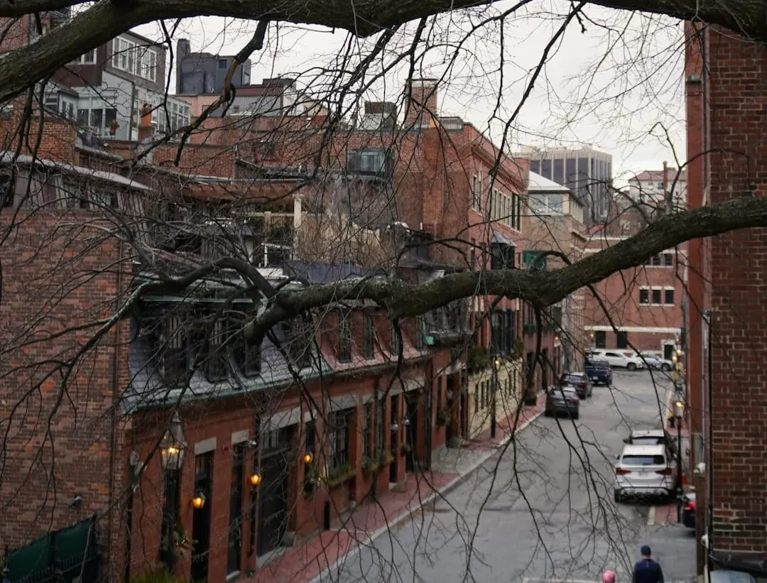 A bustling historic district street in Fayetteville showcasing preserved architecture, local commerce, and community vibrancy.
