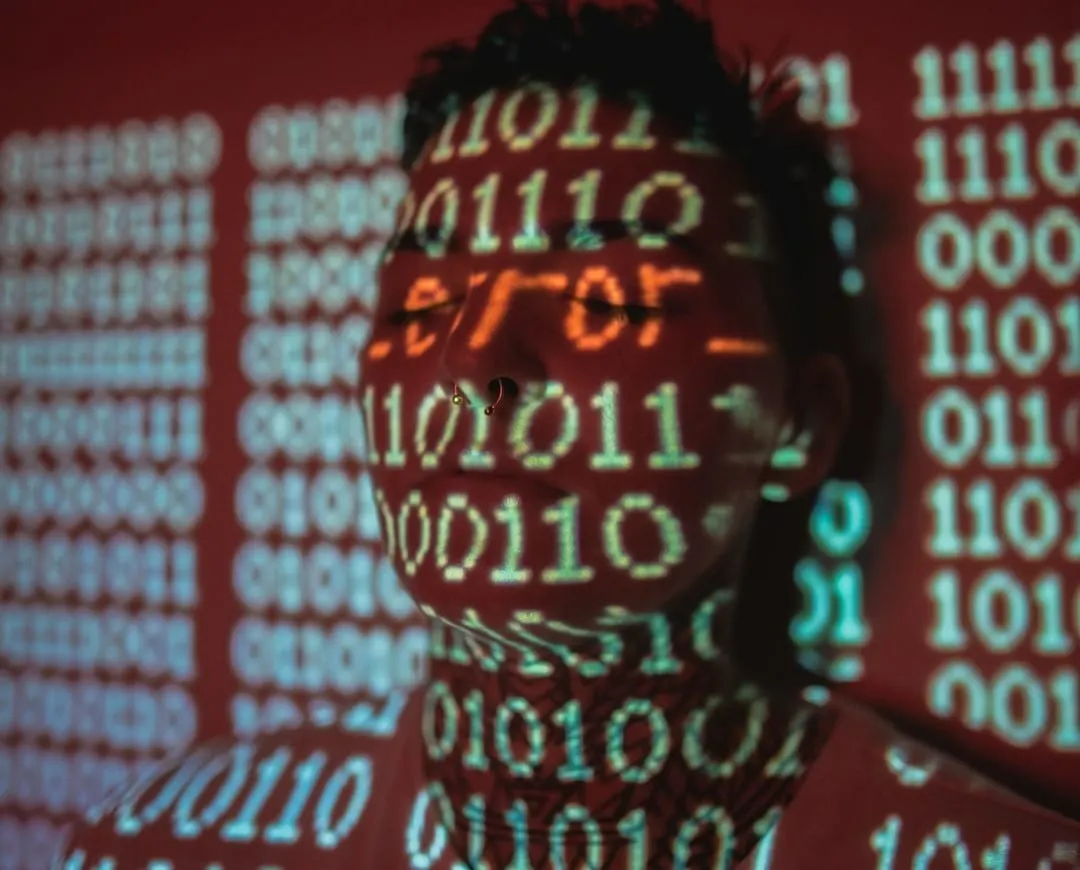 A digital shield icon protecting binary code and stylized AI circuits, representing advanced cybersecurity measures for AI models.