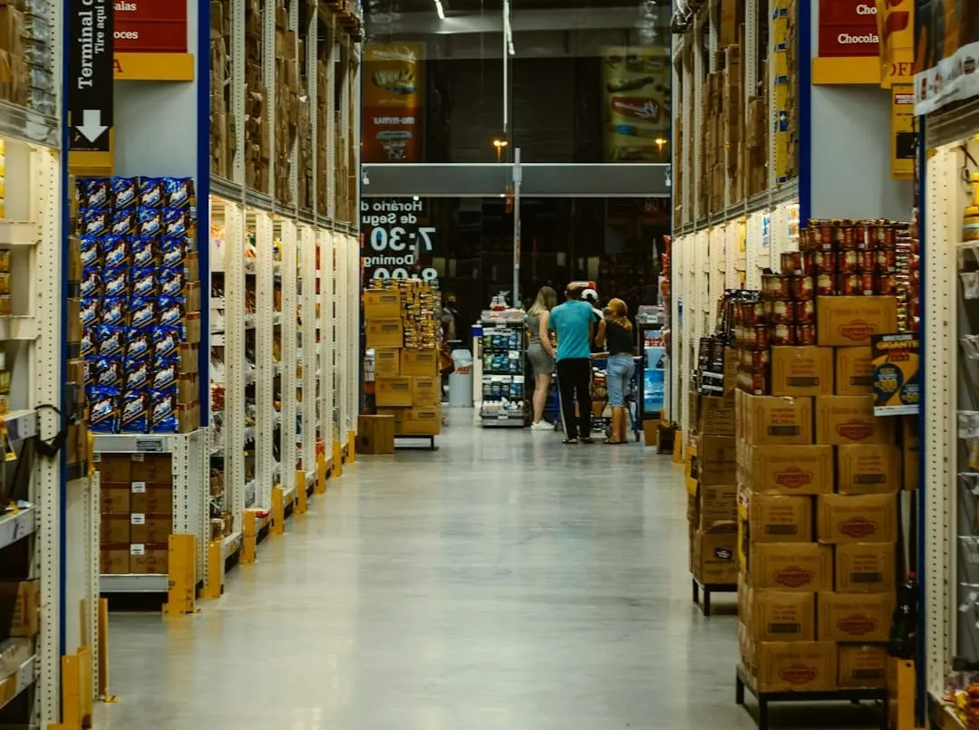 McCormick spices line a store shelf, symbolizing global supply chain connections and the impact of tariffs on retail operations.