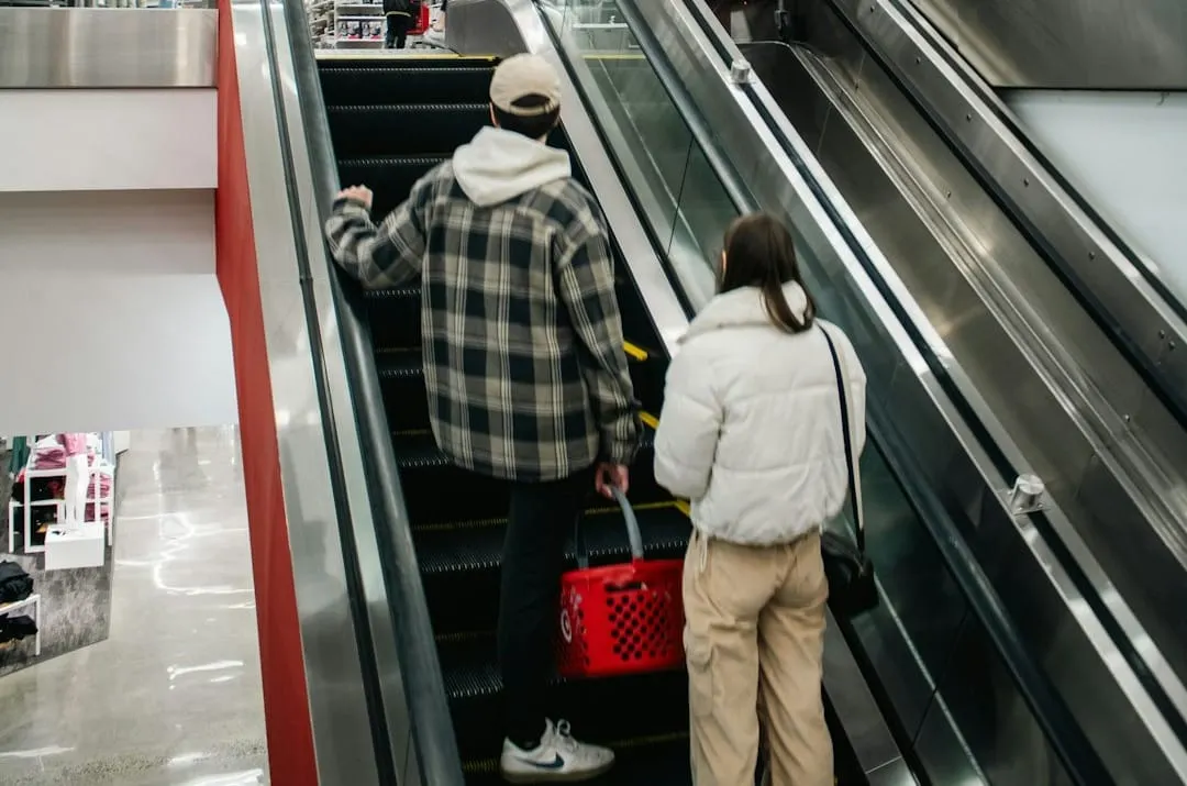 A brightly lit Target store features organized shelves and diverse shoppers browsing products, reflecting improved retail execution and an inviting omnichannel environment.