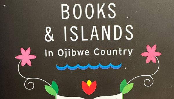 close up of black cover for Books and Islands