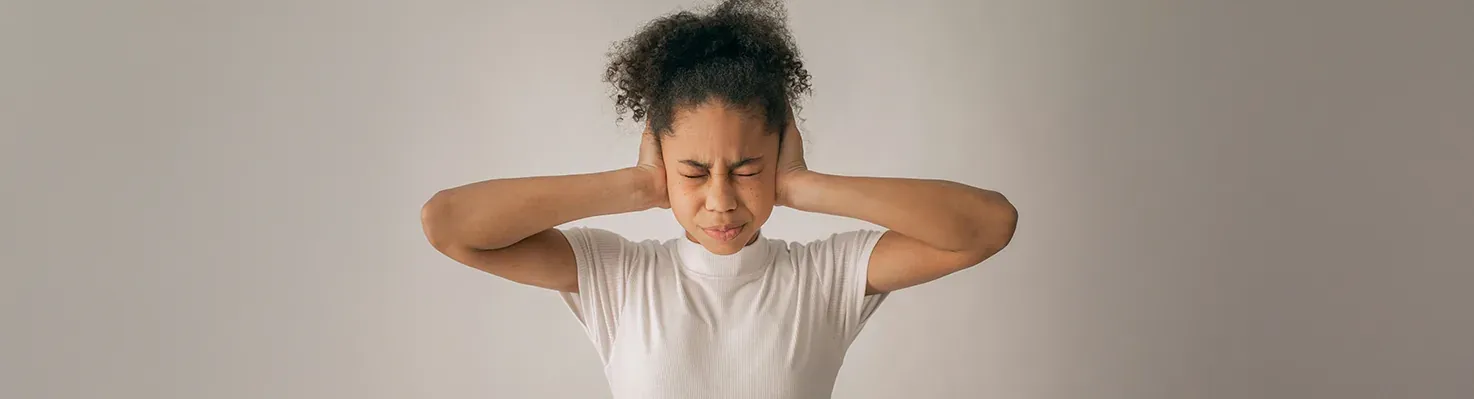 Stressed neurodivergent teen struggling with money, emphasizing the need for financial guidance.