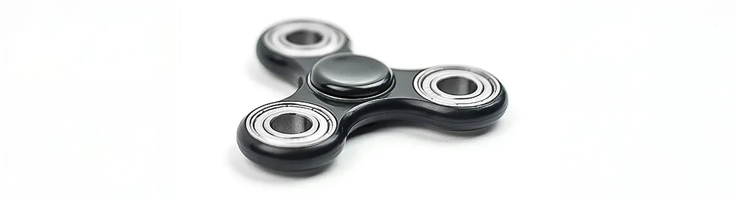 Hold a fidget spinner during a video interview.