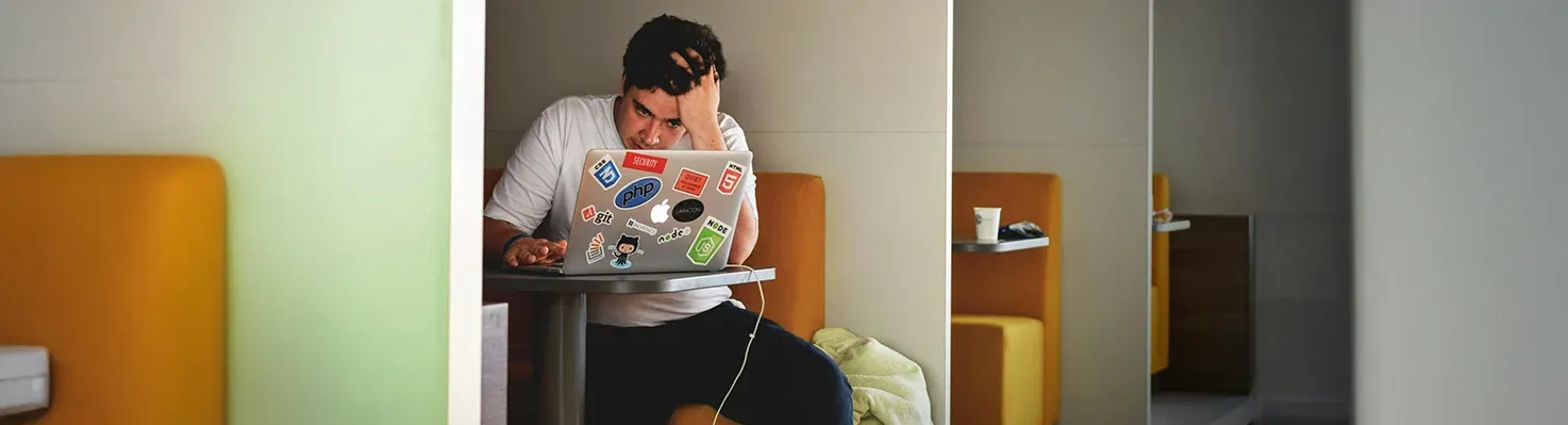 A young man wrestling with the emotional impact of job loss.