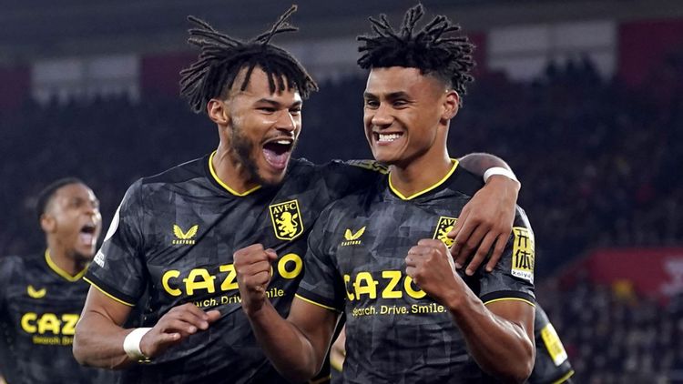 Ollie Watkins and Tyrone Mings embrace to celebrate Villa's win over Southampton