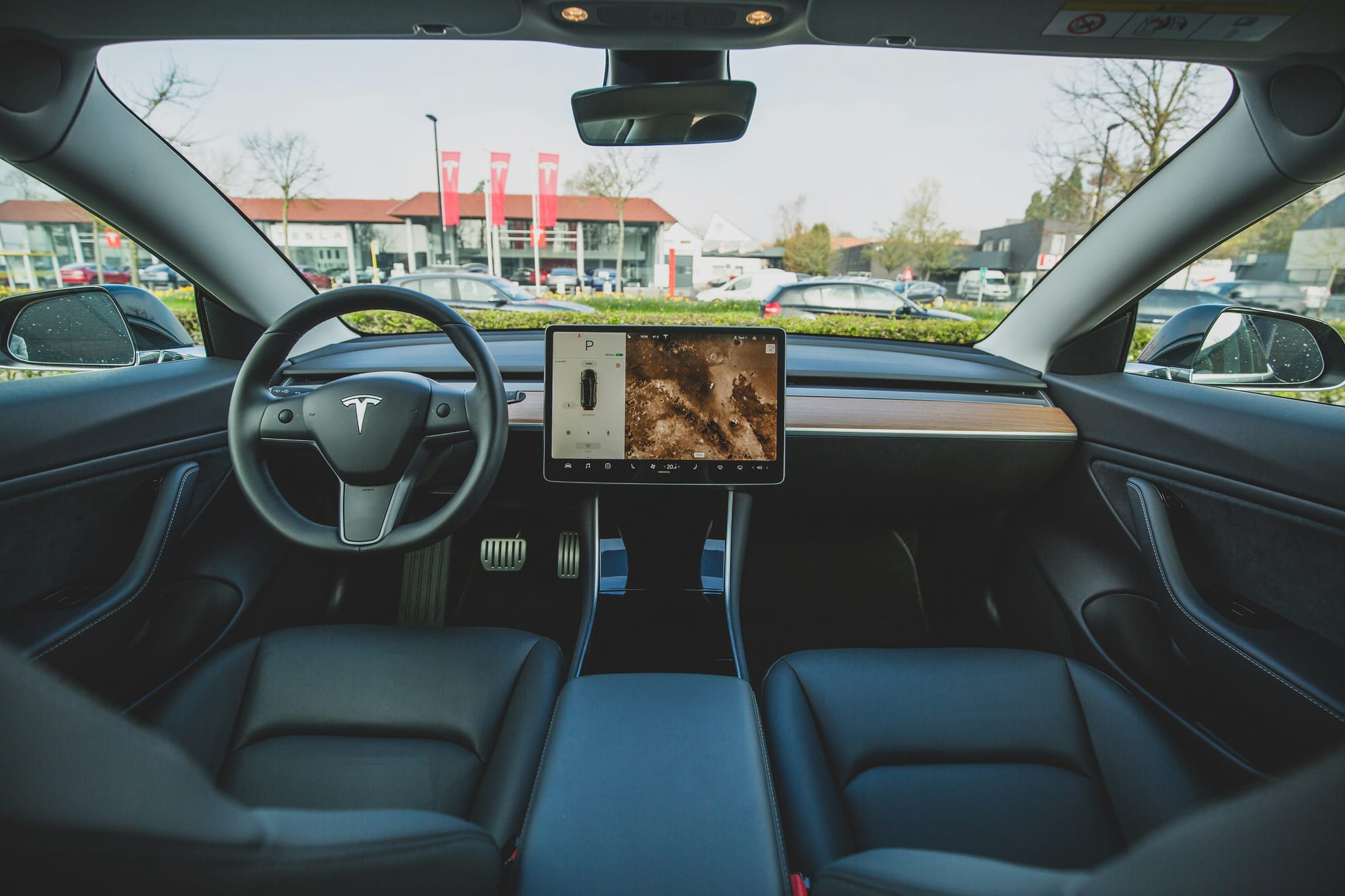 Tesla drives ahead as Wall Street cheers narrower tariff plans