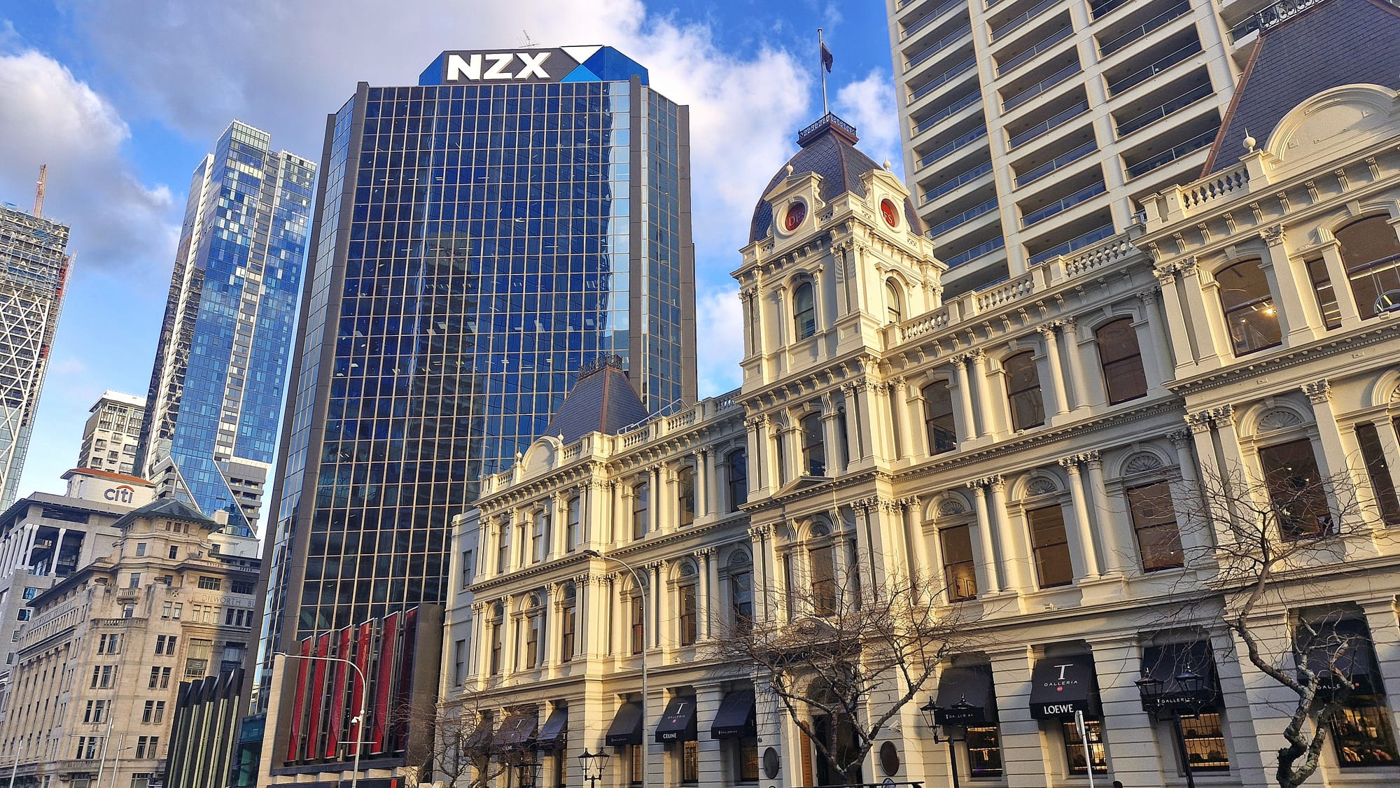 Slowing exports chill NZX50; Sky surges on Three deal