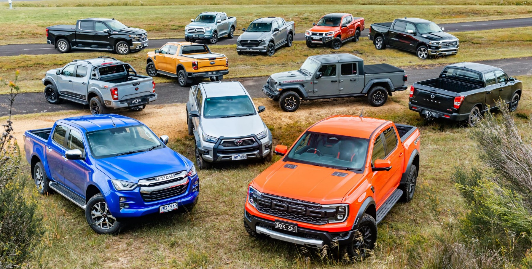 Photograph of 12 different dual cab models currently sold in Australia
