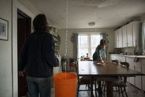 A bucket catches one kitchen leak while another drips onto the dinner table. The first fix handled the visible problem, not the pattern.