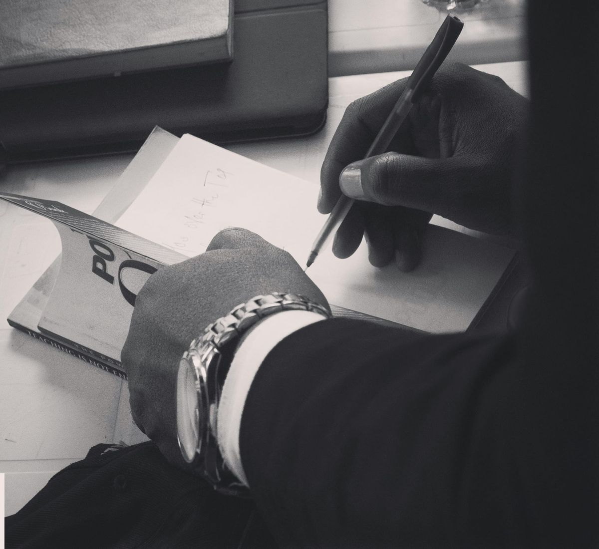 Please enjoy this stock photo of some hands and help us guess what the title of the book is, based on what we can see. I choose to believe it says Pound On and it's a workbook for writers meant to convey the basic message "keep fuckin."